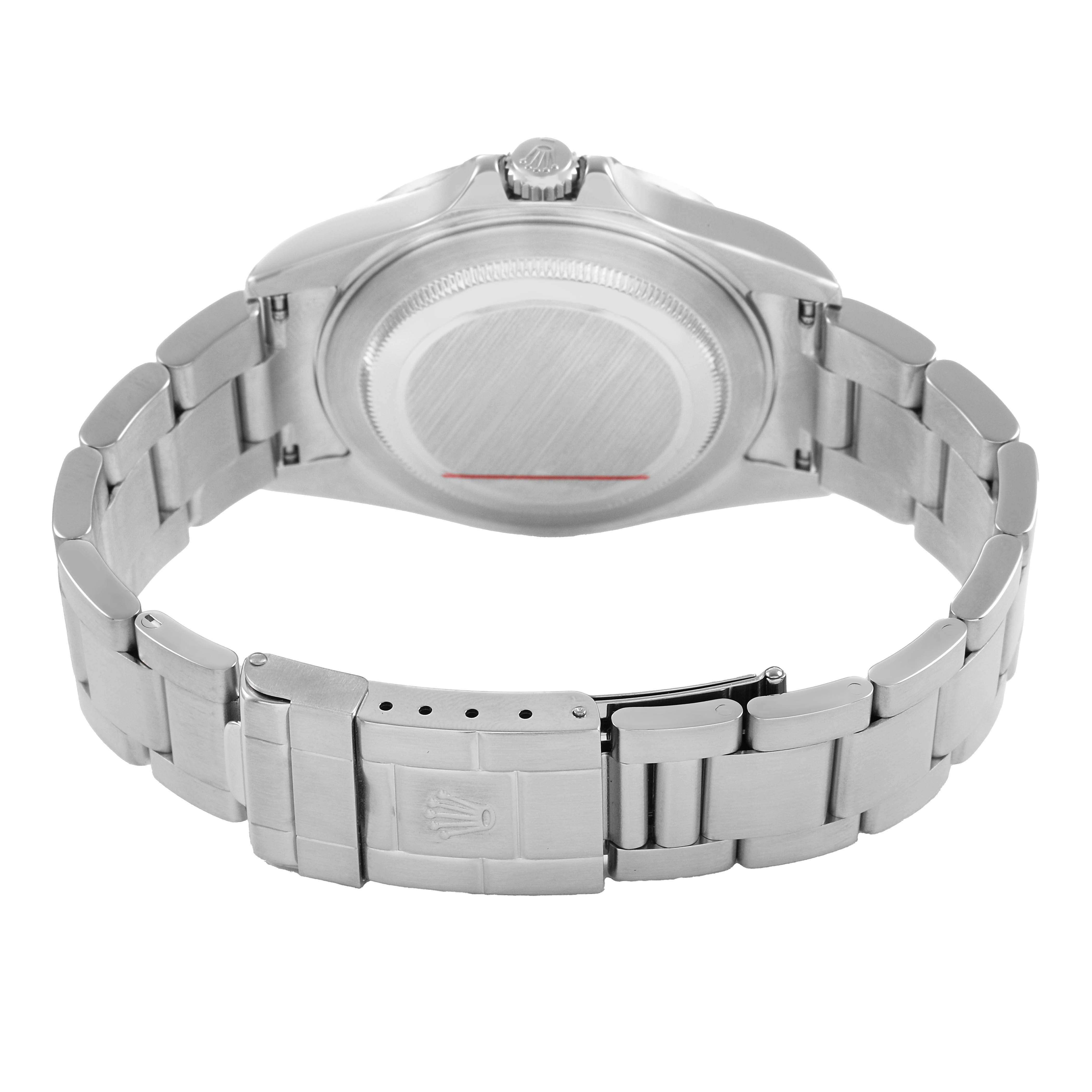 The image shows the back of a Rolex Explorer 16570 T Men's Stainless Steel Black Dial watch, highlighting the case back and bracelet clasp.