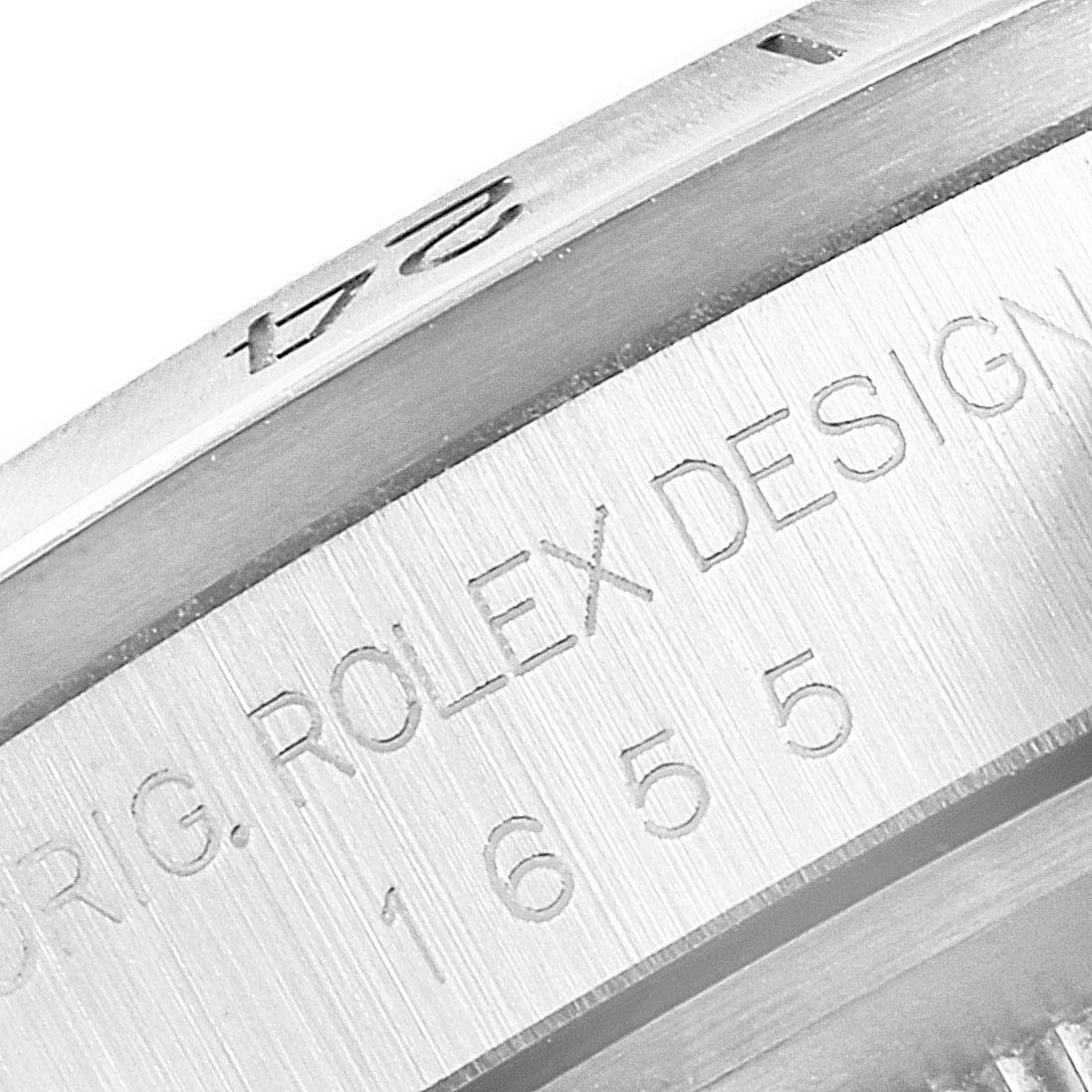 This close-up angle shows engravings on the side of the case of a Rolex Explorer 1655 Men's Stainless Steel Black Dial 1655 Men's Stainless Steel Black Dial watch.