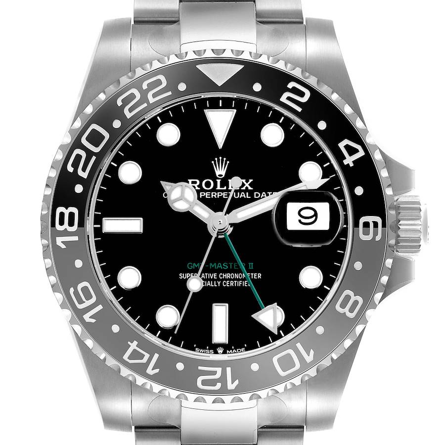 The Rolex GMT-Master model is shown from a straight-on angle, displaying the face, hands, bezel, crown, and bracelet top.