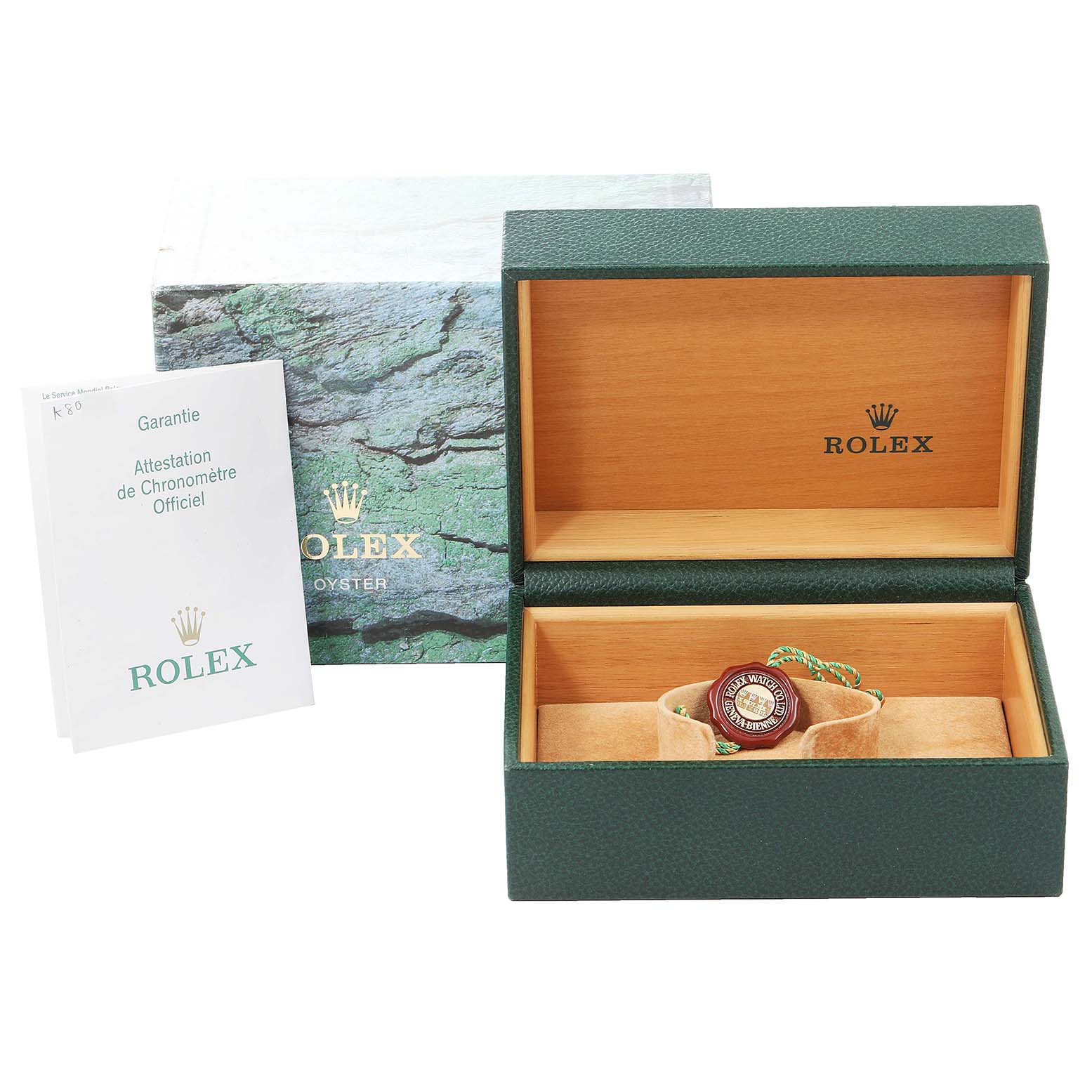 The image shows a Rolex GMT-Master 16710 Men
s Stainless Steel Black Dial 16710 Men
s Stainless Steel Black Dial watch in its presentation box with corresponding packaging and warranty booklets.