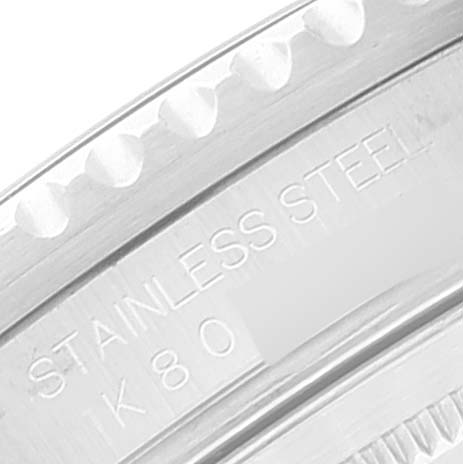 This image shows a close-up of the side of a stainless steel bezel with the "STAINLESS STEEL" engraving on the Rolex GMT-Master 16710 Men
s Stainless Steel Black Dial 16710 Men
s Stainless Steel Black Dial watch.