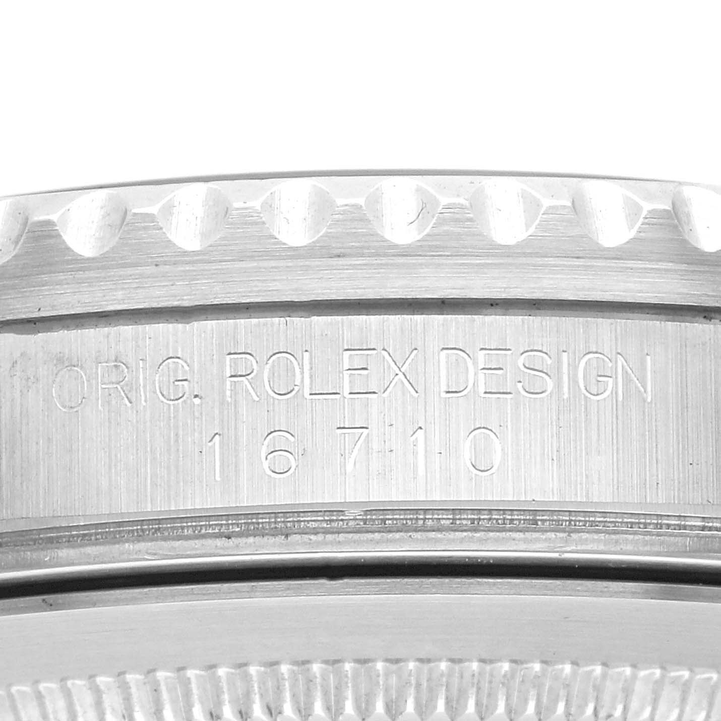 The image shows the side view of the Rolex GMT-Master 16710 Men
s Stainless Steel Black Dial 16710 Men
s Stainless Steel Black Dial, featuring the engraved model number "16710" and bezel details.