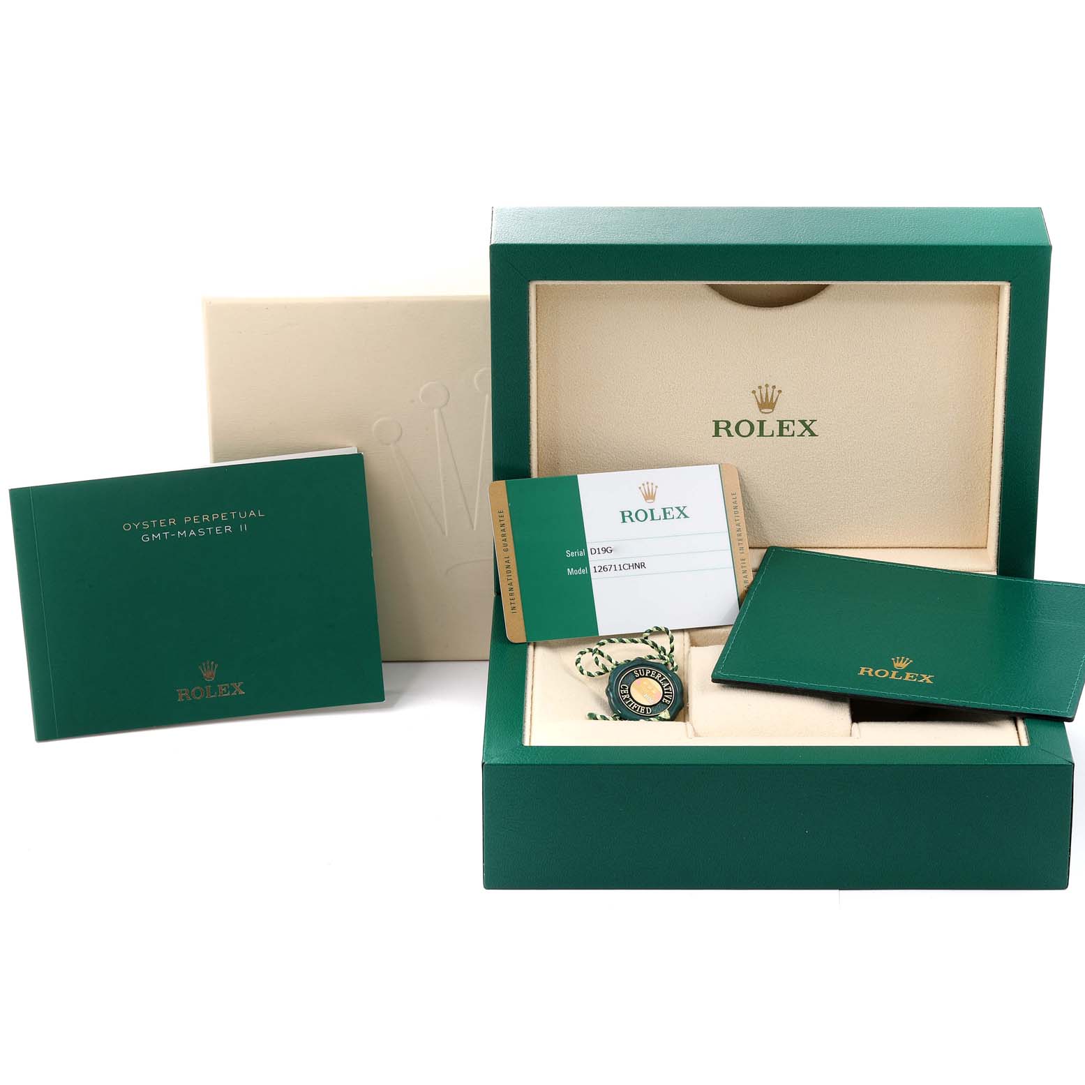 This image shows the packaging and accessories of a Rolex GMT-Master 126711 Men's Steel and Gold (two tone) Black Dial 126711 Men's Steel and Gold (two tone) Black Dial II, including the box, booklet, warranty card, and hang tags.