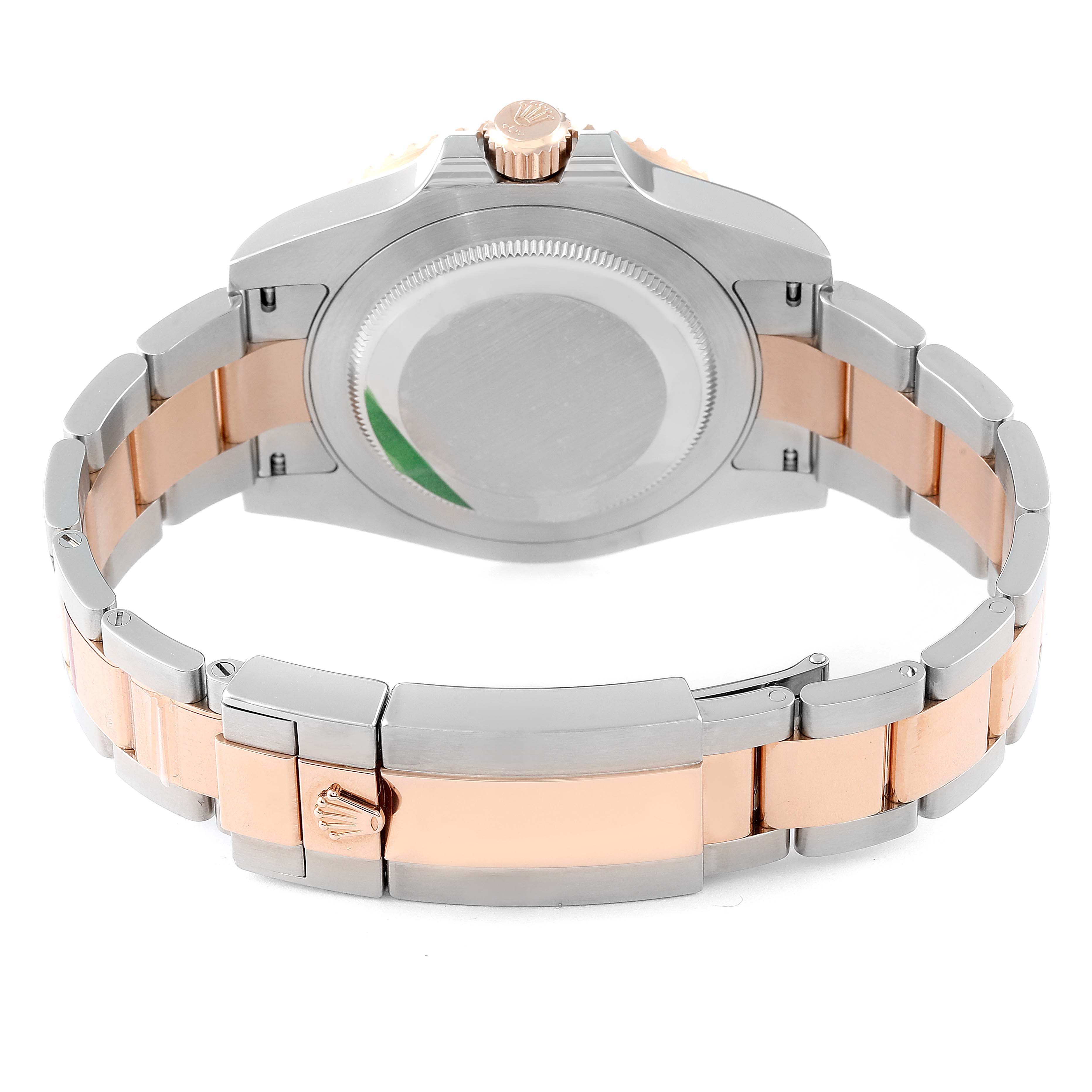 This image shows the back case, crown, and bracelet of the Rolex GMT-Master 126711 Men's Steel and Gold (two tone) Black Dial 126711 Men's Steel and Gold (two tone) Black Dial watch.