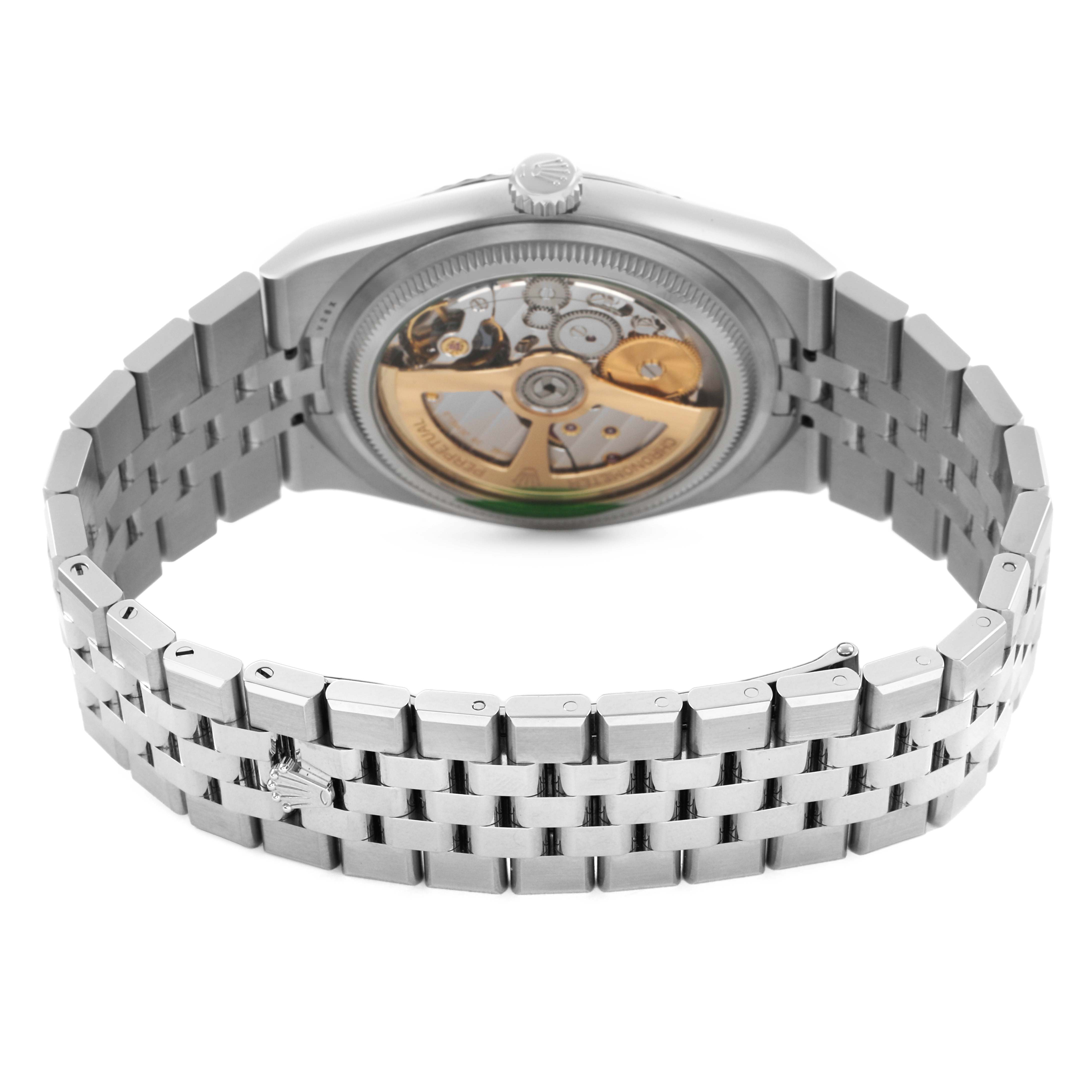The Rolex Land‑Dweller 127334 Men's Steel and Gold (two tone) White Dial watch is shown from the back, highlighting the case back and bracelet.