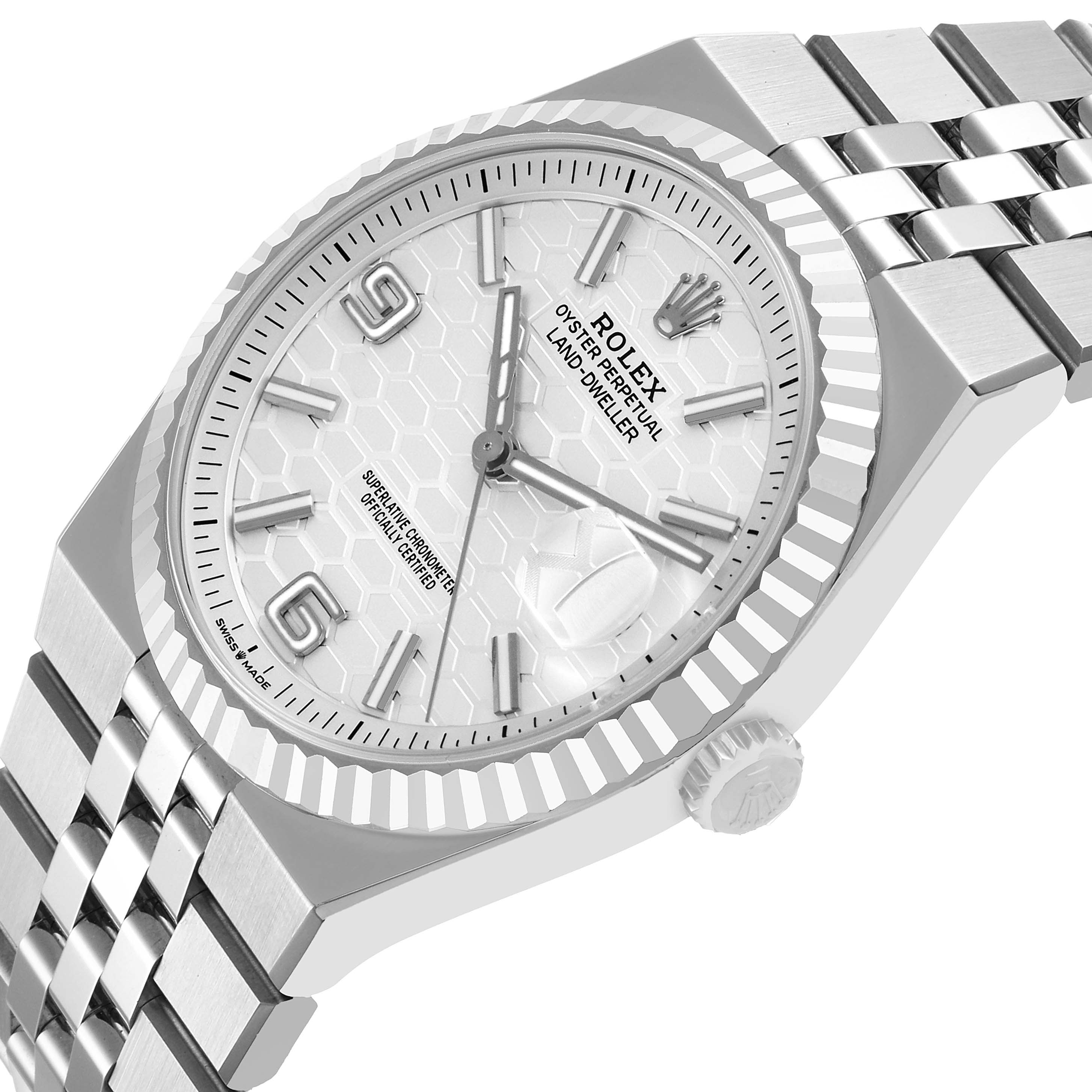 The Rolex Land-Dweller watch is shown at a slight angle, highlighting the dial, bezel, bracelet, and crown.