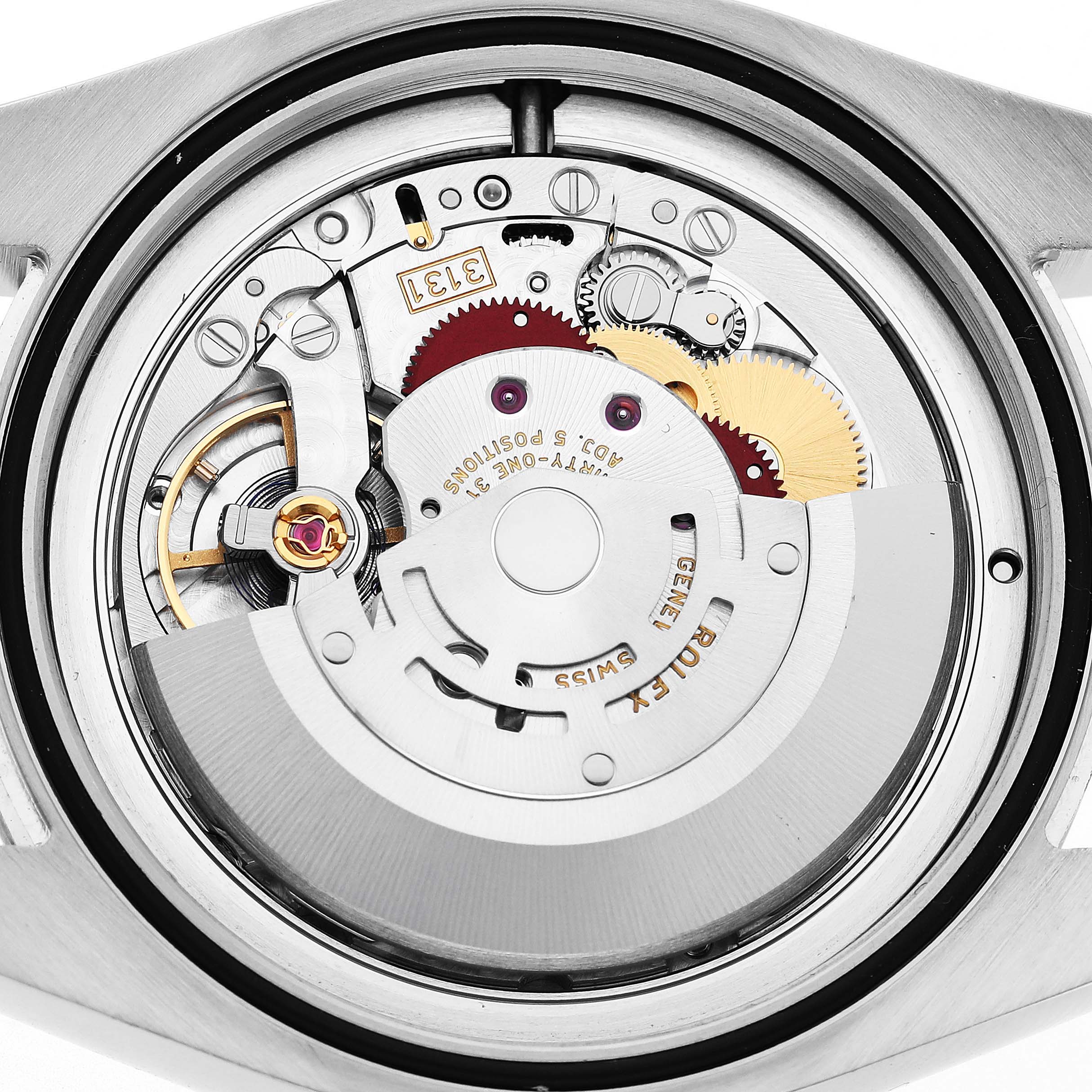 The image shows the back view of a Rolex Milgauss M116400GV Men's Stainless Steel Blue Dial, showcasing its intricate automatic movement.