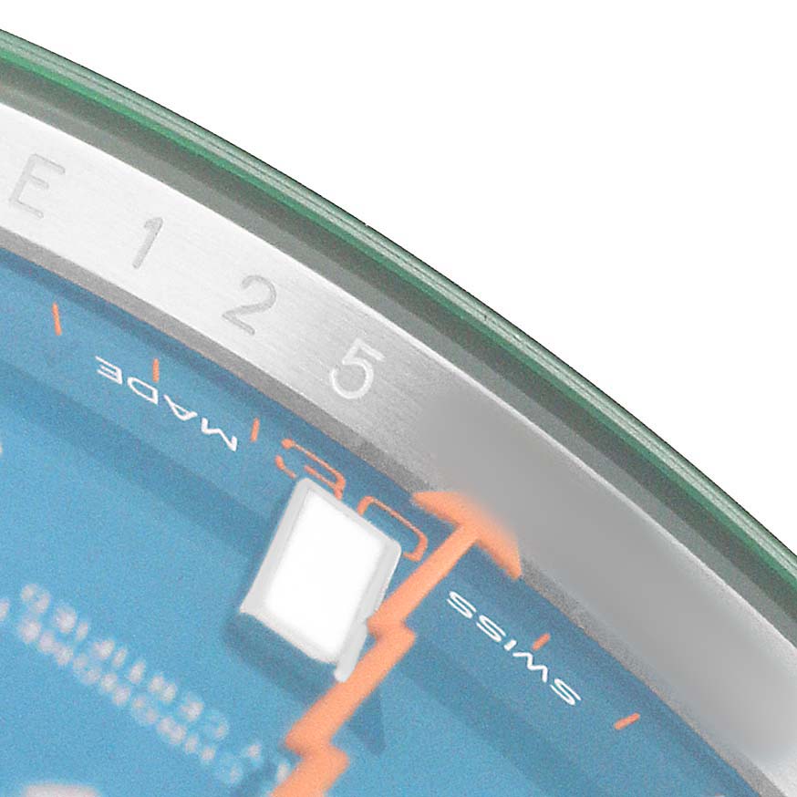 The image shows a close-up of the Rolex Milgauss M116400GV Men's Stainless Steel Blue Dial watch face at an angle, highlighting the minute markers and the lightning bolt second hand.
