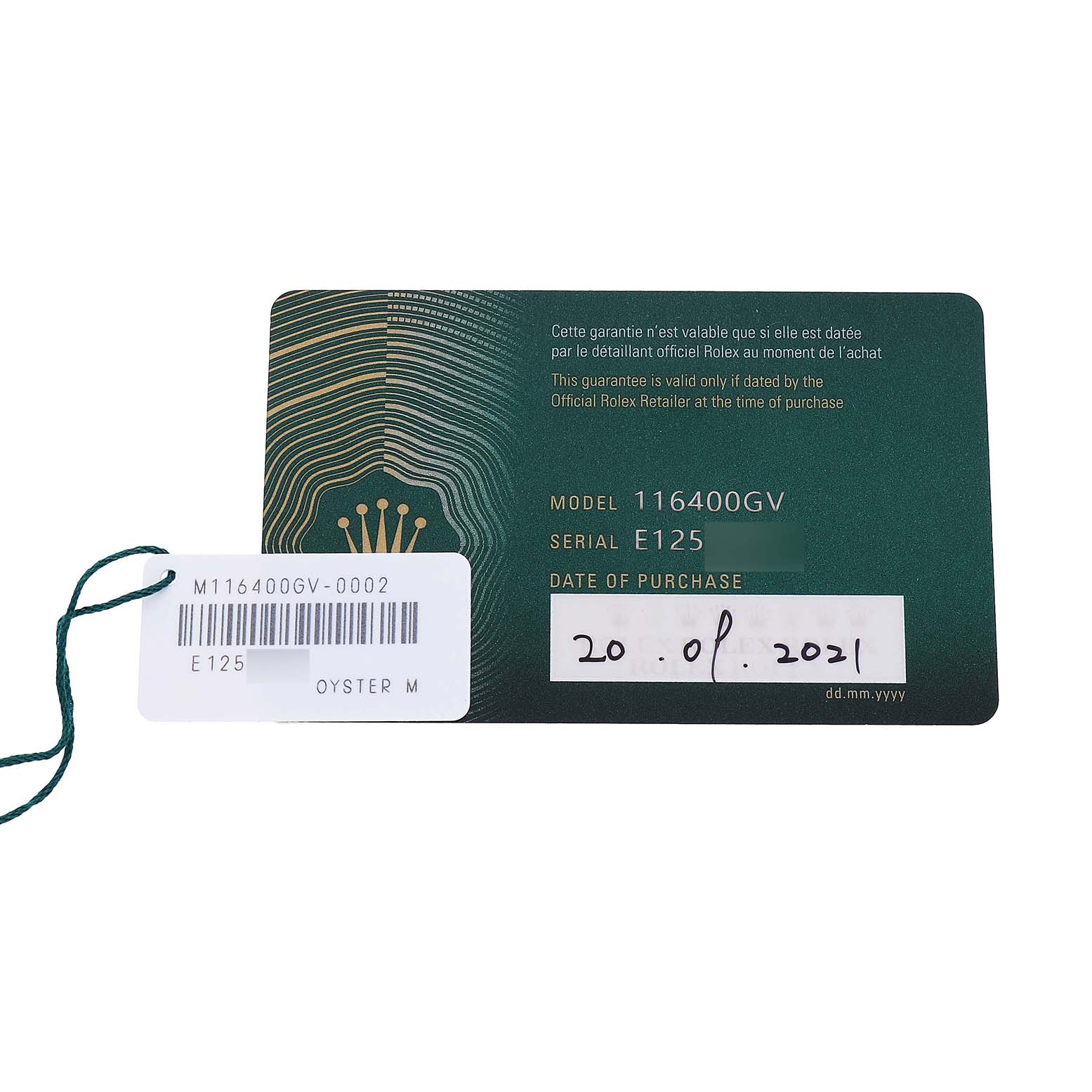 The image shows a warranty card and tag for the Rolex Milgauss M116400GV Men's Stainless Steel Blue Dial model, including model and serial information.