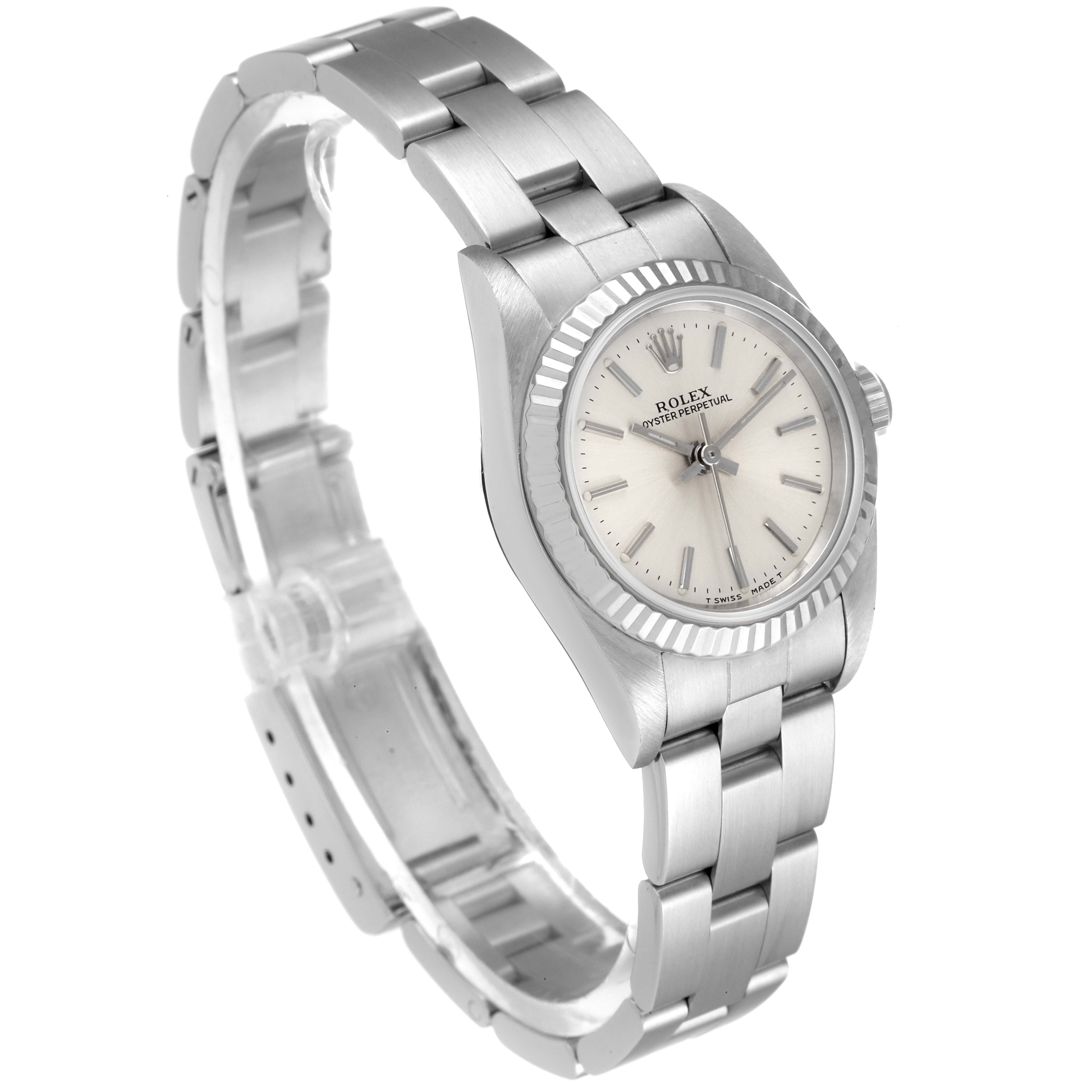 The Rolex Oyster Perpetual 67194 Women's Stainless Steel Silver Dial 67194 Women's Stainless Steel Silver Dial watch is shown at a three-quarter angle displaying the face, bezel, bracelet, and clasp.