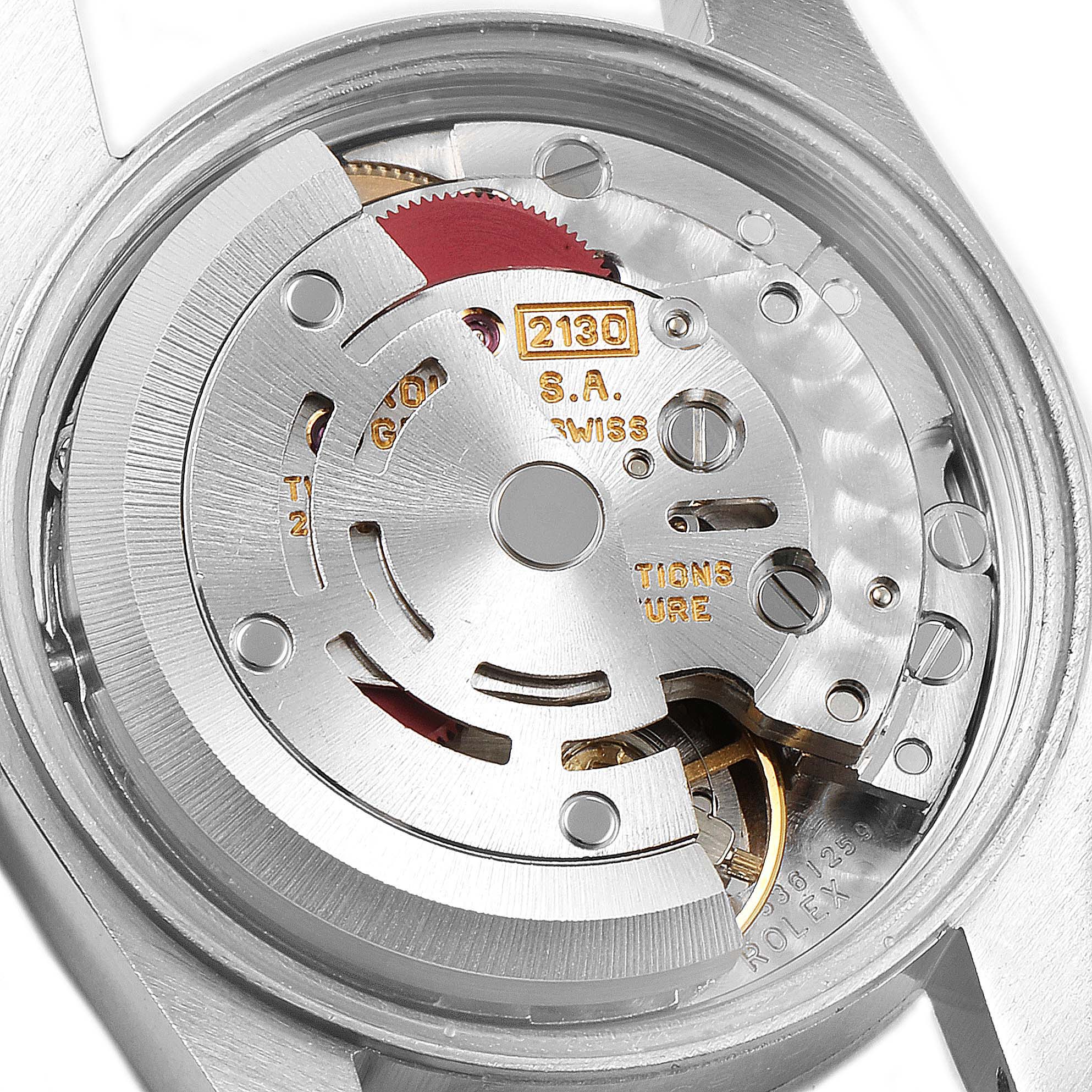 This image shows a close-up view of the internal movement mechanism of a Rolex Oyster Perpetual 67194 Women's Stainless Steel Silver Dial 67194 Women's Stainless Steel Silver Dial watch.