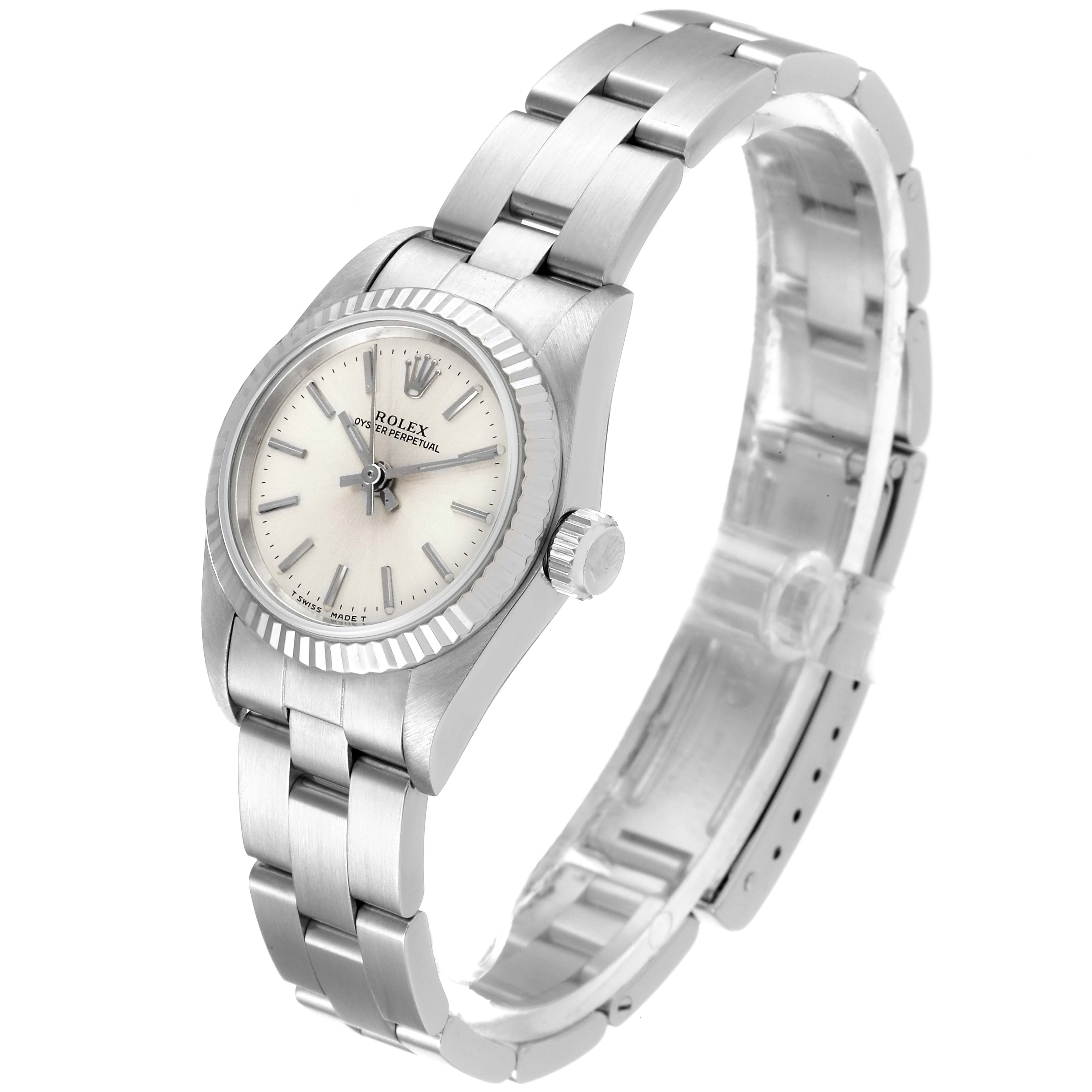 The image shows a side angle of a Rolex Oyster Perpetual 67194 Women's Stainless Steel Silver Dial 67194 Women's Stainless Steel Silver Dial watch, highlighting the dial, bezel, and metal bracelet.