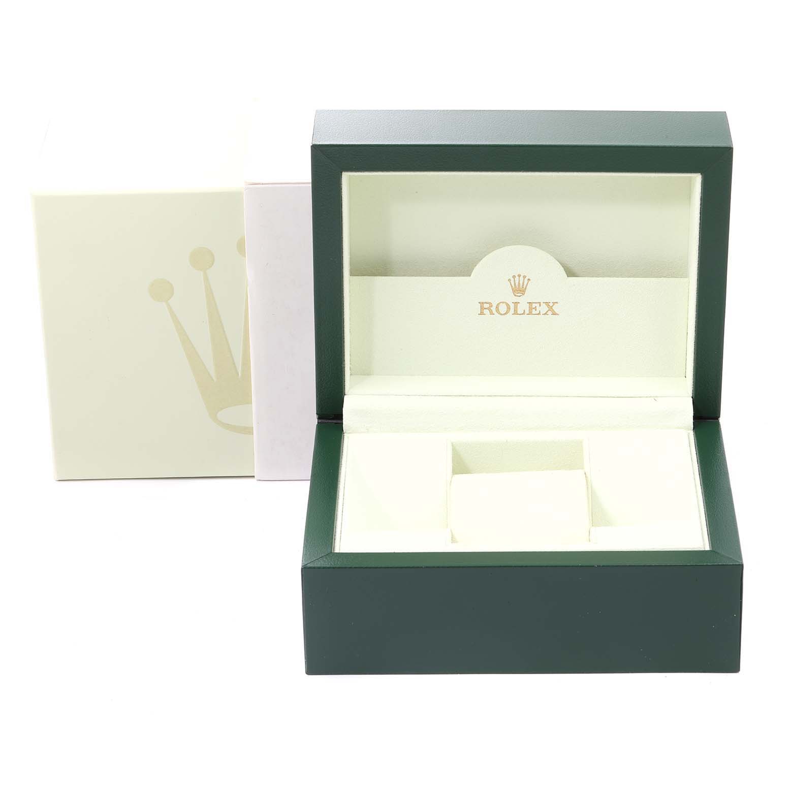 The image shows an open Rolex Oyster Perpetual 116034 Men
s Stainless Steel Pink Dial 116034 Men
s Stainless Steel Pink Dial watch box at a front angle, displaying its interior.