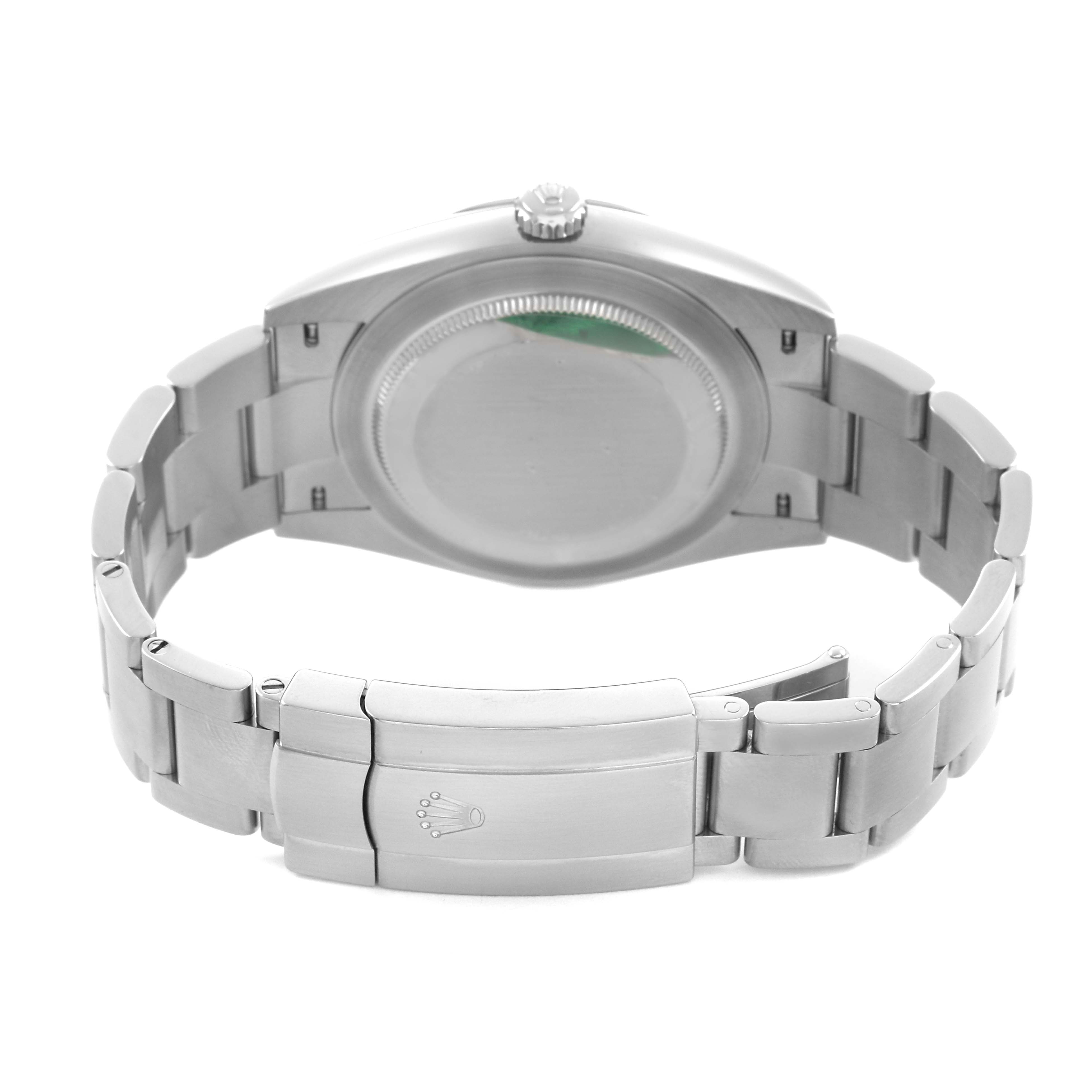 The Rolex Oyster Perpetual 124300 Men's Stainless Steel Blue Dial watch is shown from the back, highlighting the case back and bracelet with the clasp visible.