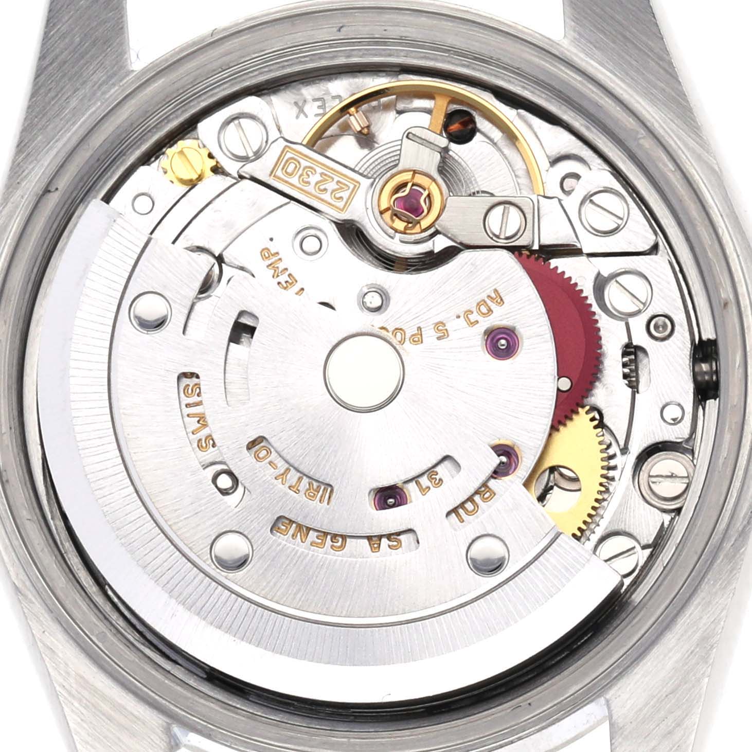 The image shows the movement of a Rolex Oyster Perpetual 76080 Women
s Stainless Steel Black Dial 76080 Women
s Stainless Steel Black Dial watch, including gears and the rotor mechanism, viewed from the back.