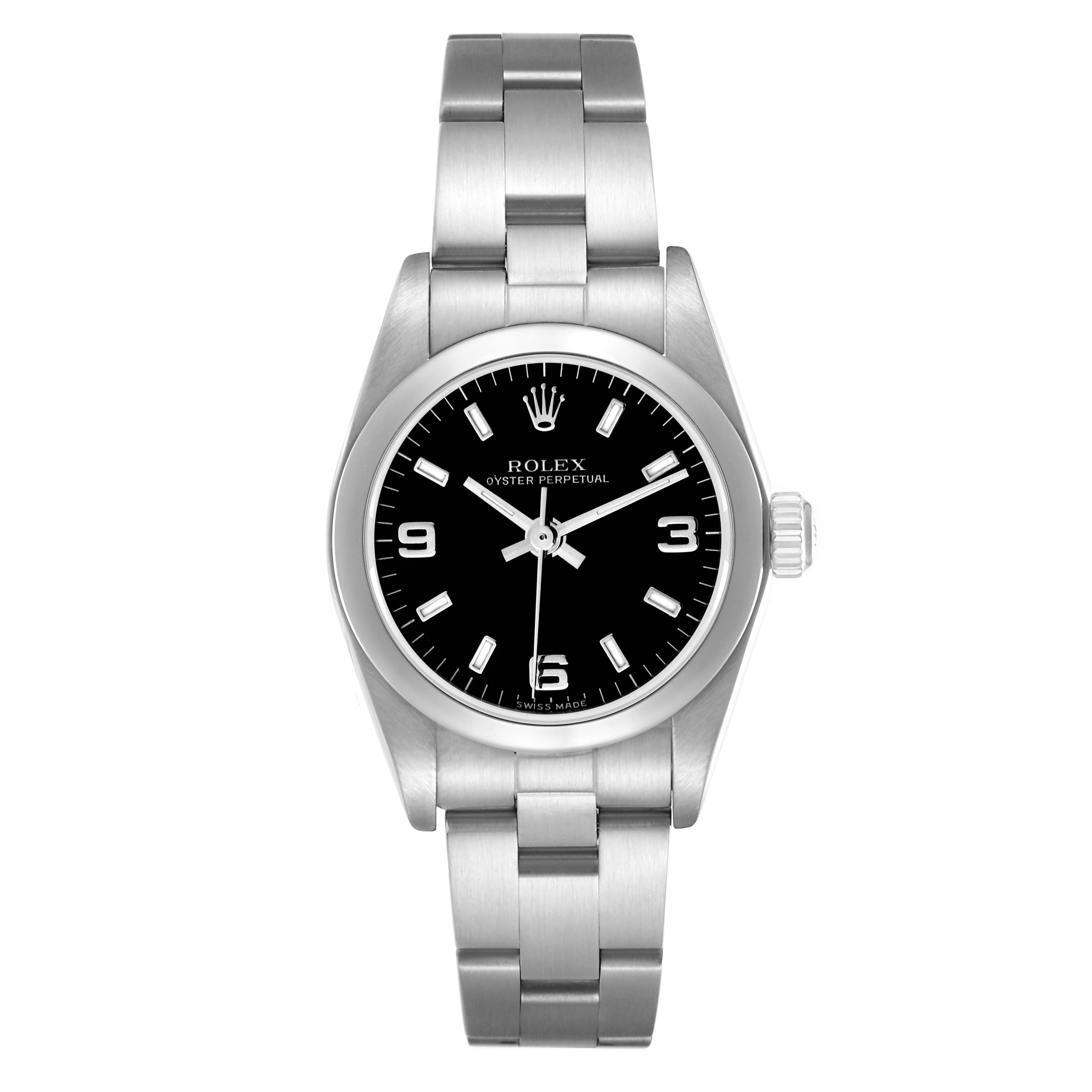 The Rolex Oyster Perpetual 76080 Women
s Stainless Steel Black Dial 76080 Women
s Stainless Steel Black Dial watch is shown from a top-down angle, displaying the face, bezel, and bracelet.