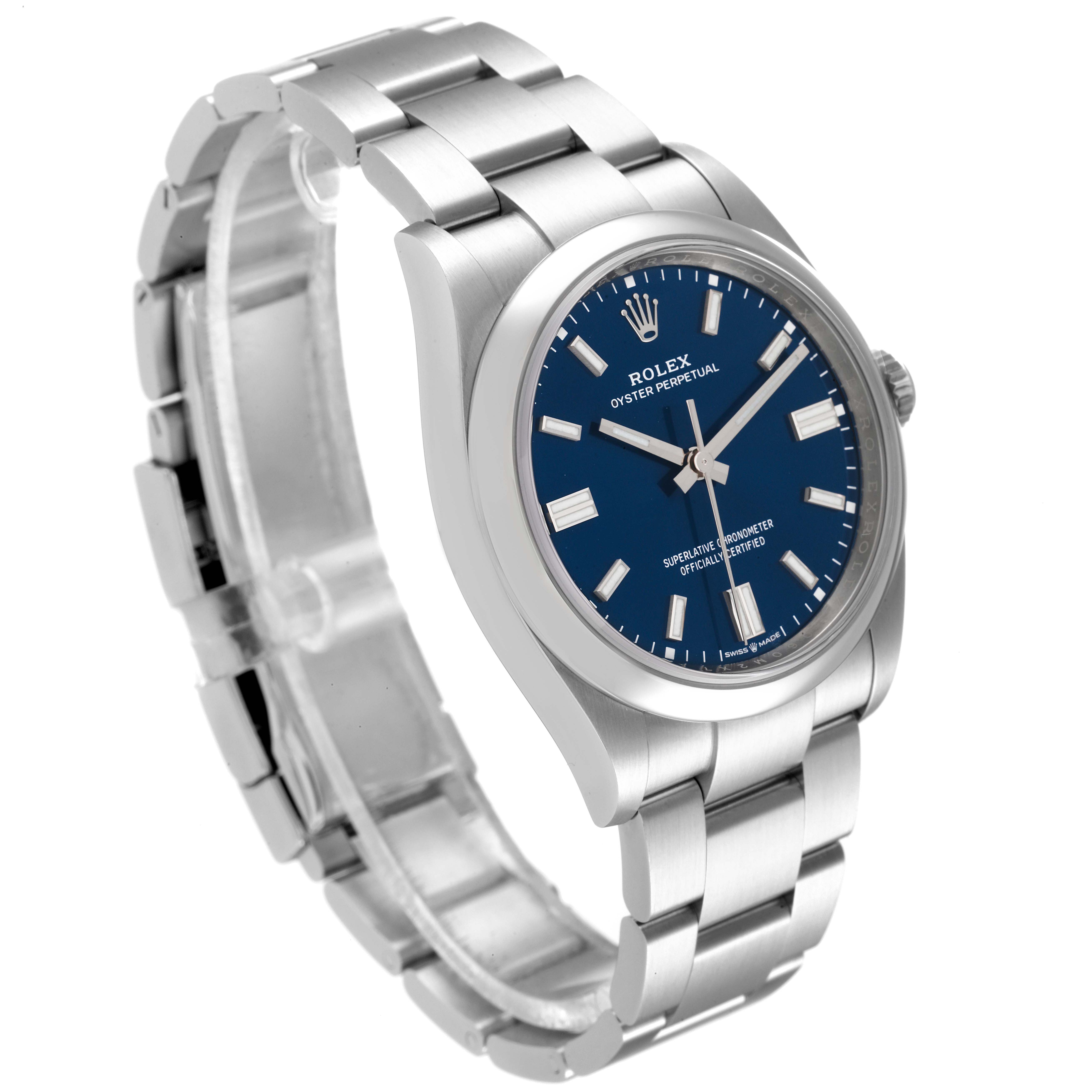 The image shows a side angle view of a Rolex Oyster Perpetual 126000 Men's Stainless Steel Blue Dial 126000 Men's Stainless Steel Blue Dial watch, highlighting its blue dial, bezel, and bracelet.