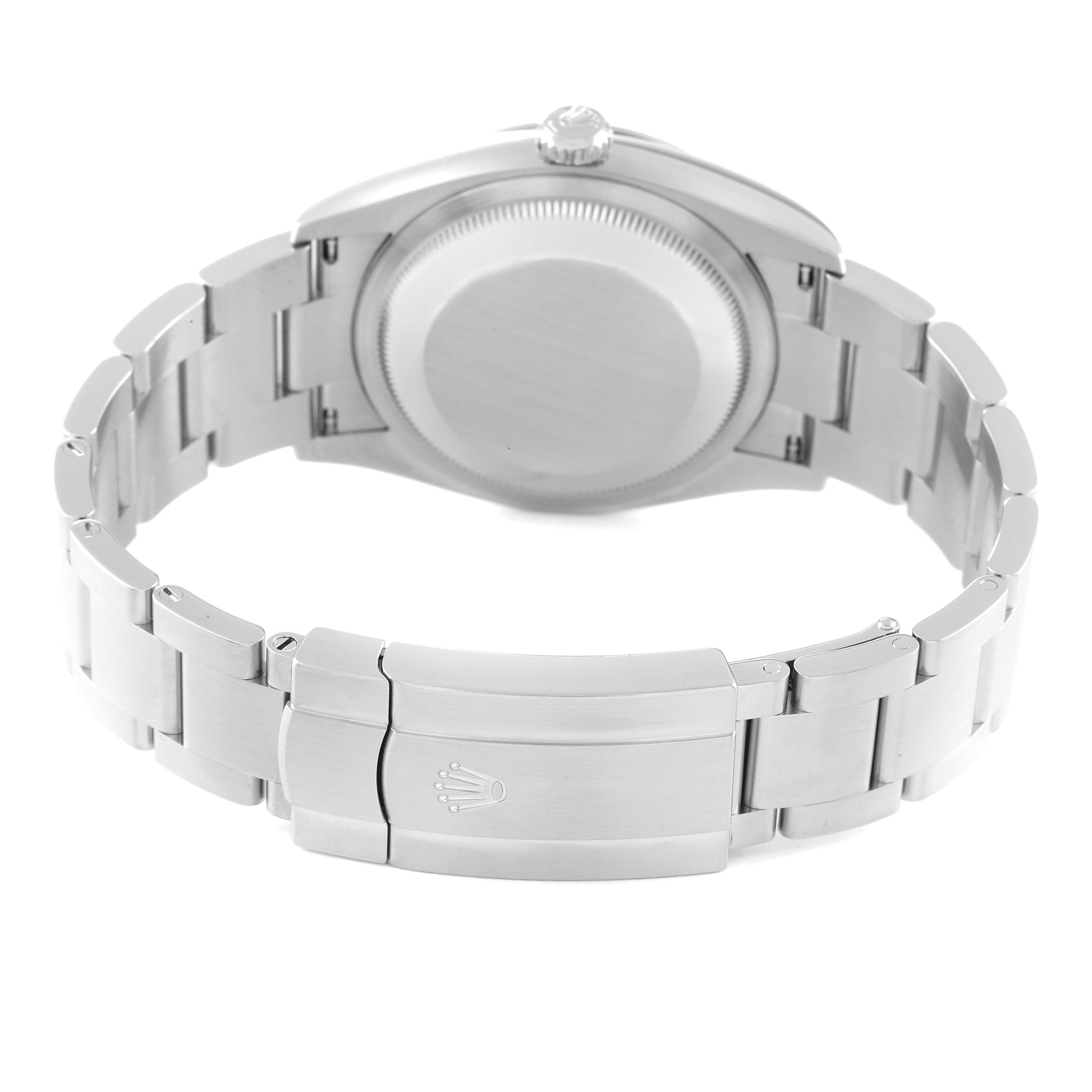 The image shows the back view of a Rolex Oyster Perpetual 126000 Men's Stainless Steel Blue Dial 126000 Men's Stainless Steel Blue Dial watch, focused on the case back and bracelet clasp.