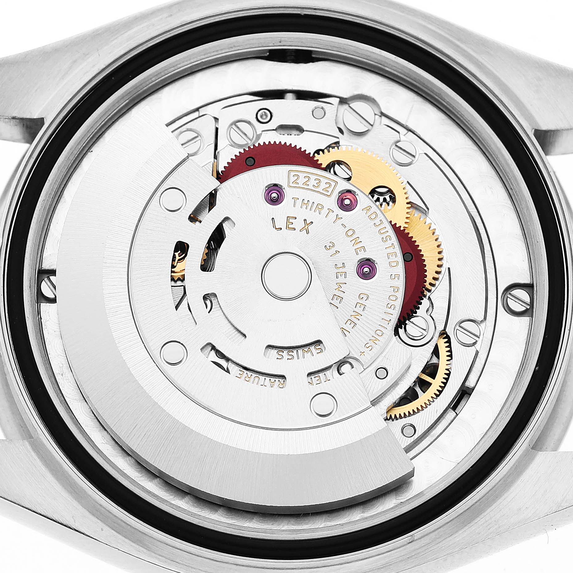 The image shows the movement of a Rolex Oyster Perpetual 277200 Women's Stainless Steel Blue Dial watch from the back, highlighting gears and the rotor.