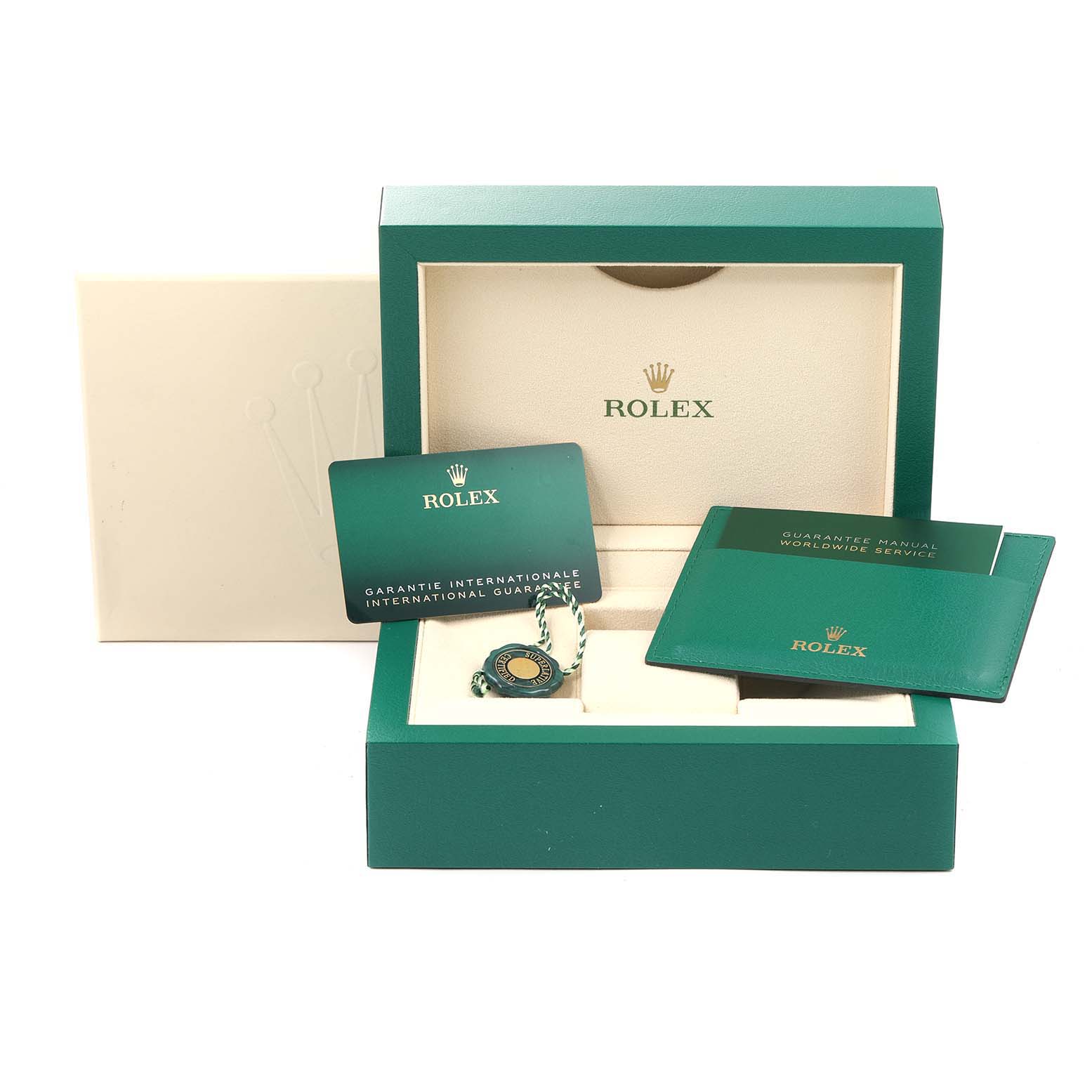 The image features the presentation box, guarantee card, tag, and manuals for a Rolex Oyster Perpetual 276200 Women
s Stainless Steel Blue Dial 276200 Women
s Stainless Steel Blue Dial model watch.