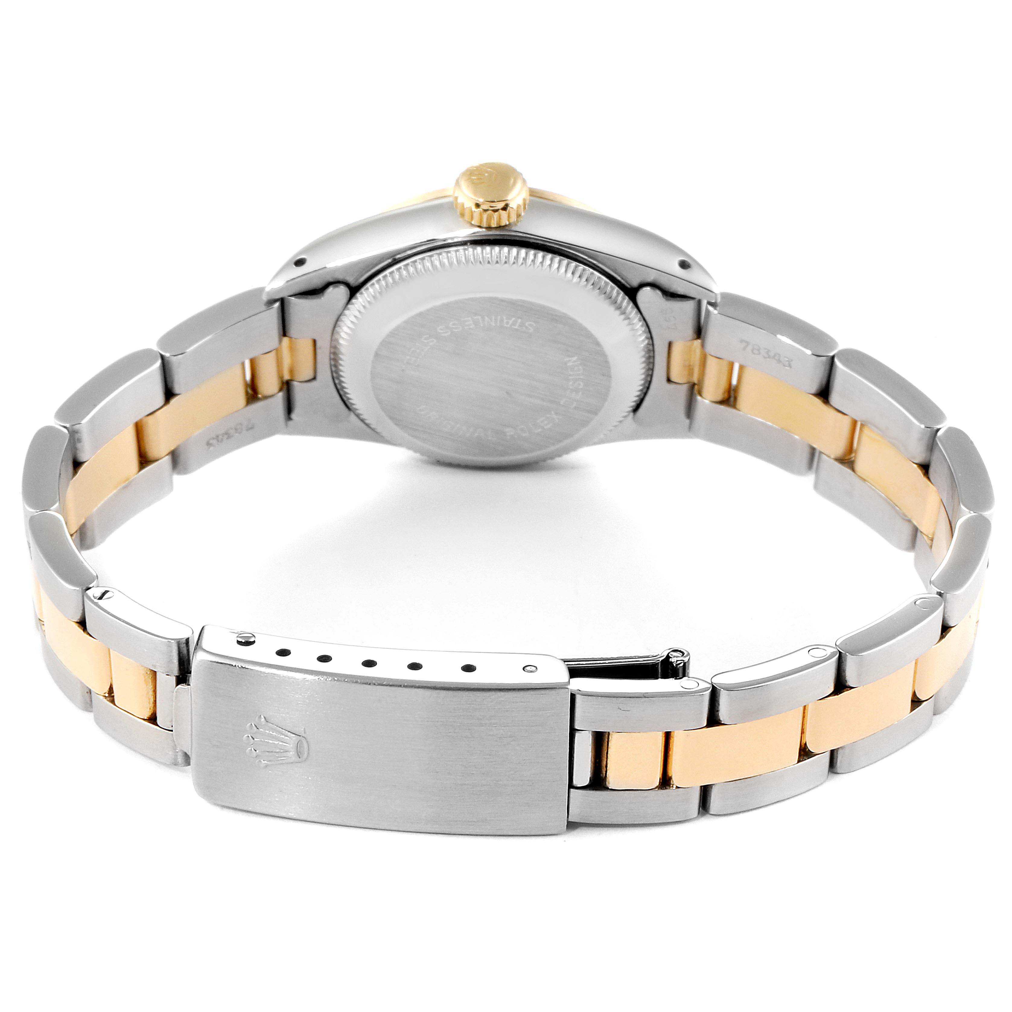 The image shows the back view of the Rolex Oyster Perpetual 67183 Women's Steel and Gold (two tone) Champagne Dial 67183 Women's Steel and Gold (two tone) Champagne Dial watch, focusing on the bracelet and case back.