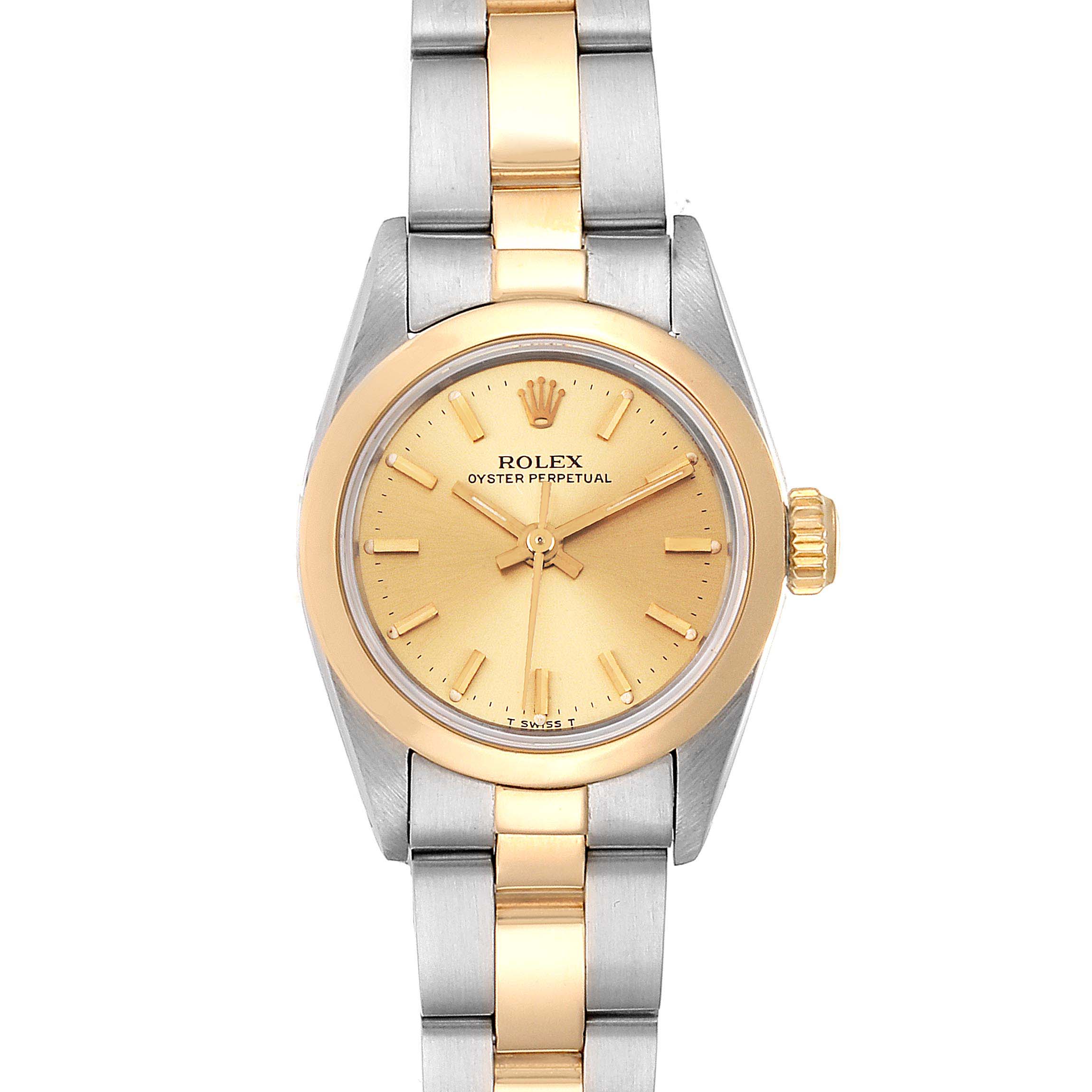 The image shows a front view of the Rolex Oyster Perpetual 67183 Women's Steel and Gold (two tone) Champagne Dial 67183 Women's Steel and Gold (two tone) Champagne Dial watch, highlighting its dial, bezel, and two-tone bracelet.