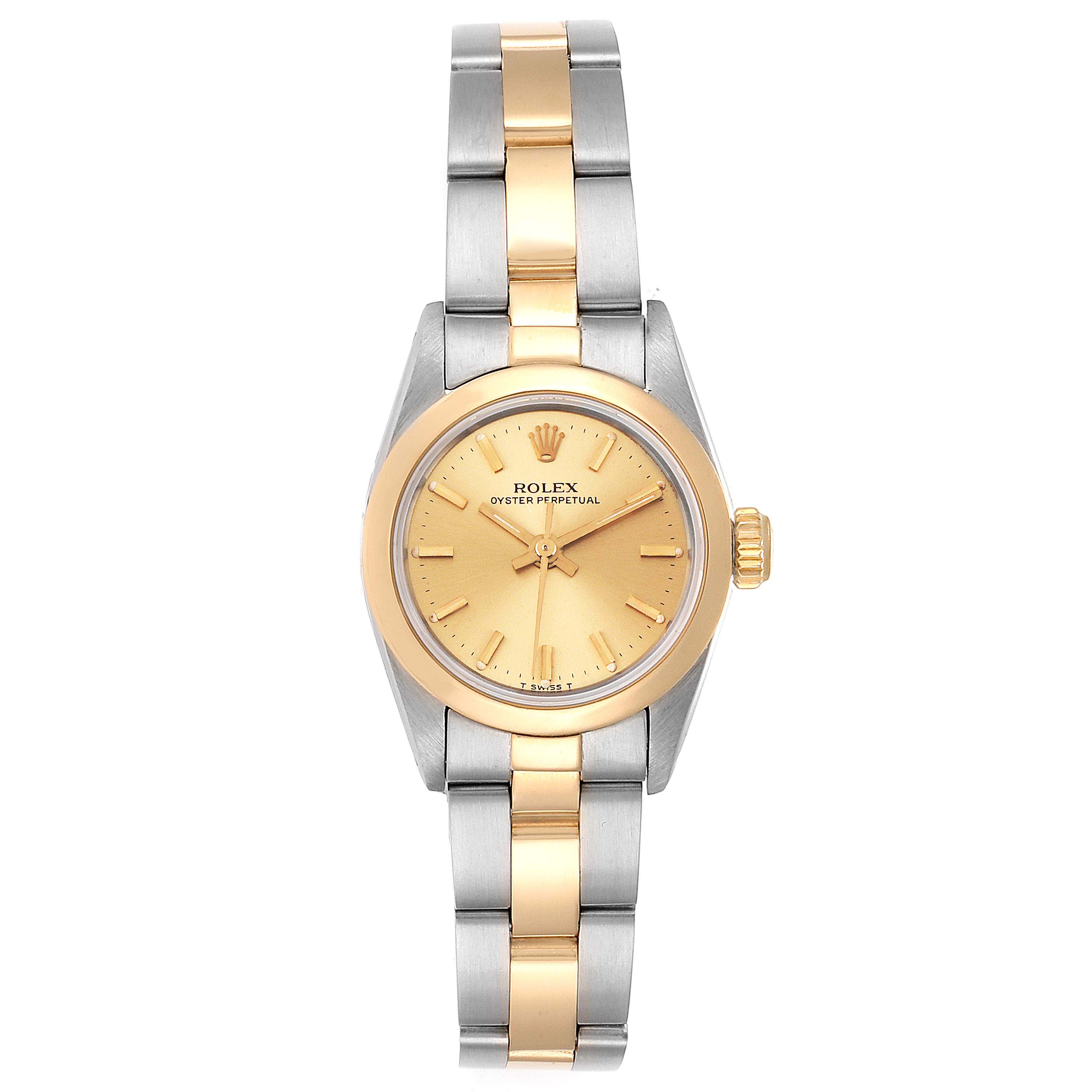 The image shows a front view of a Rolex Oyster Perpetual 67183 Women's Steel and Gold (two tone) Champagne Dial 67183 Women's Steel and Gold (two tone) Champagne Dial watch, displaying its dial, bezel, and bracelet.