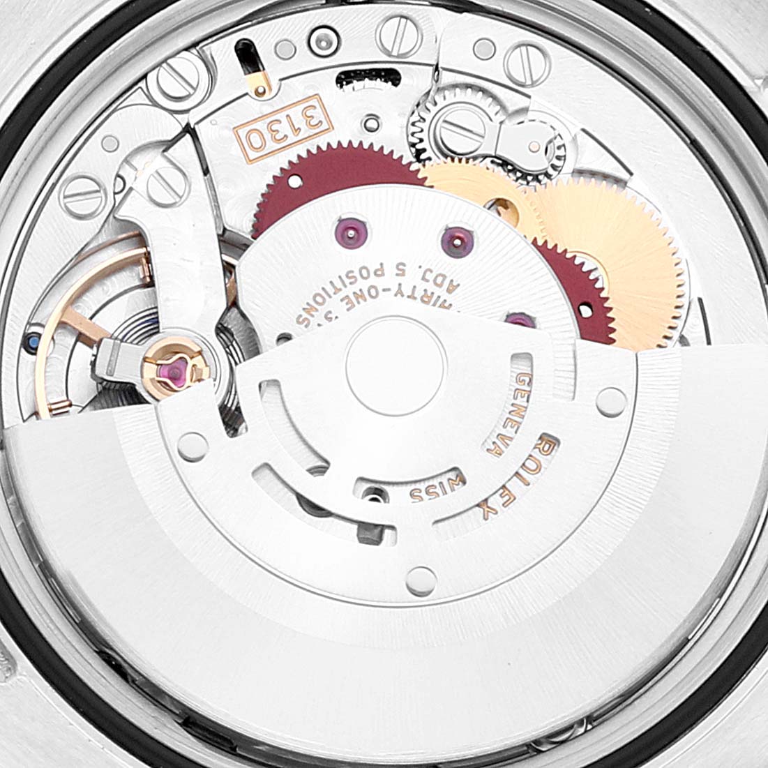 This image shows a close-up of the movement mechanism inside the Rolex Oyster Perpetual 116000 Men's Stainless Steel Grey Dial 116000 Men's Stainless Steel Grey Dial watch.