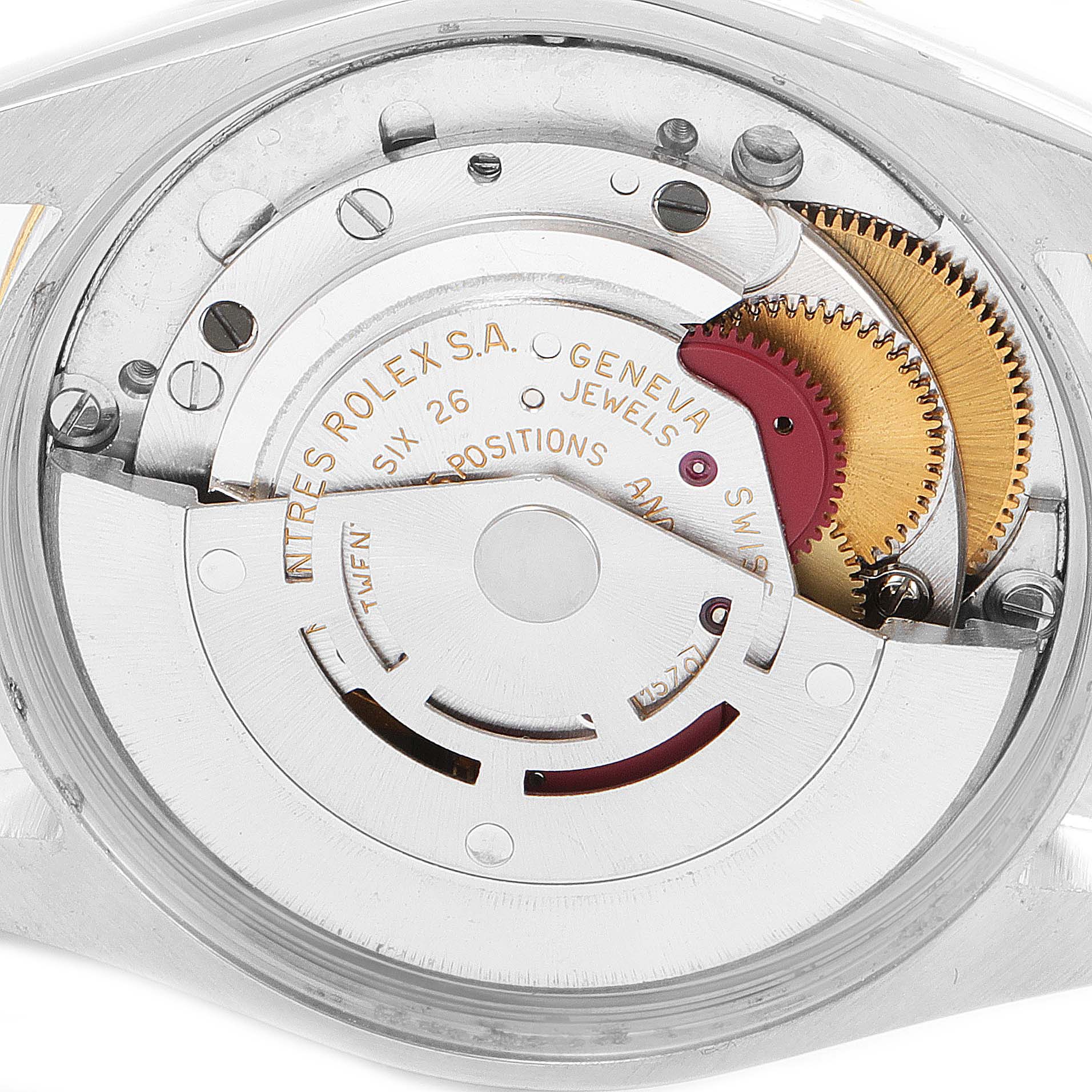 This image shows a close-up of the movement mechanism inside a Rolex Oyster Perpetual 1005 Men's Steel and Gold (two tone) Champagne Dial 1005 Men's Steel and Gold (two tone) Champagne Dial watch.