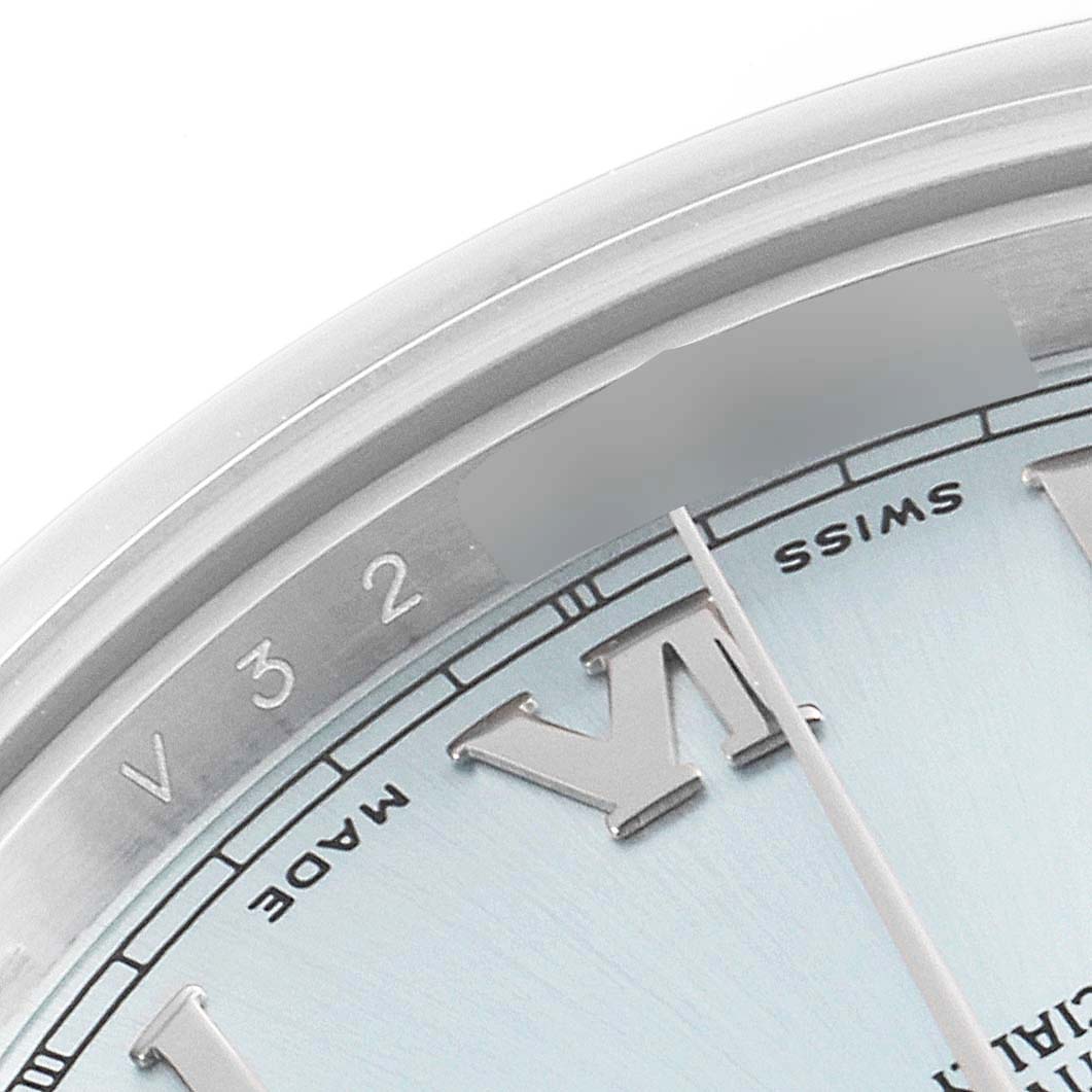 This image shows a close-up of the dial and edge of the case of a Rolex President 218206 Men's Platinum Blue Dial 218206 Men's Platinum Blue Dial model watch.