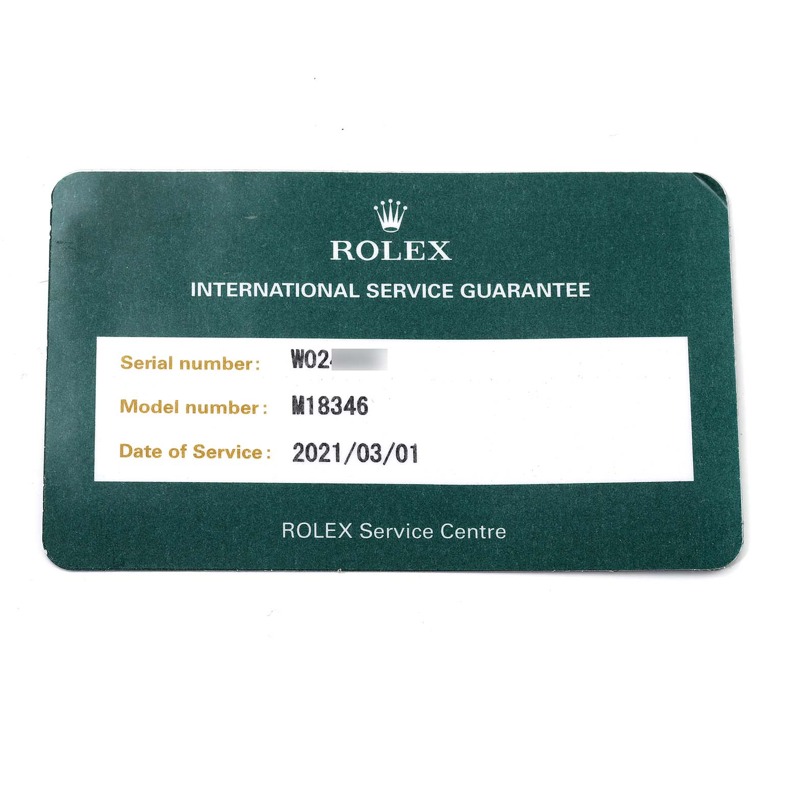 This image shows the International Service Guarantee card for a Rolex President 18346 Men's Platinum Silver Dial 18346 Men's Platinum Silver Dial model watch, detailing the serial number and service date.
