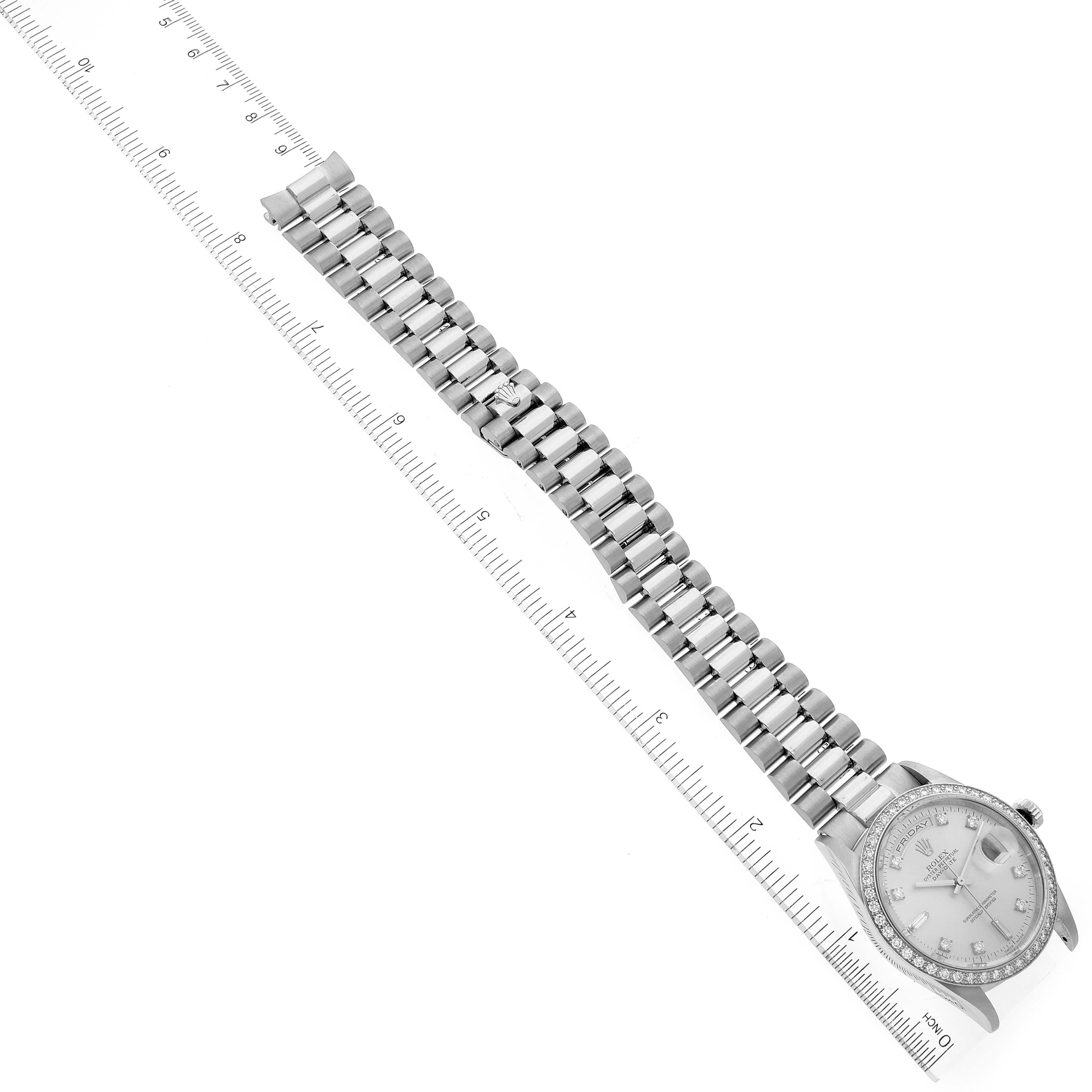 The image shows a top-down view of a Rolex President 18346 Men's Platinum Silver Dial 18346 Men's Platinum Silver Dial watch, highlighting its bracelet, face, and bezel with a ruler beside it for scale.