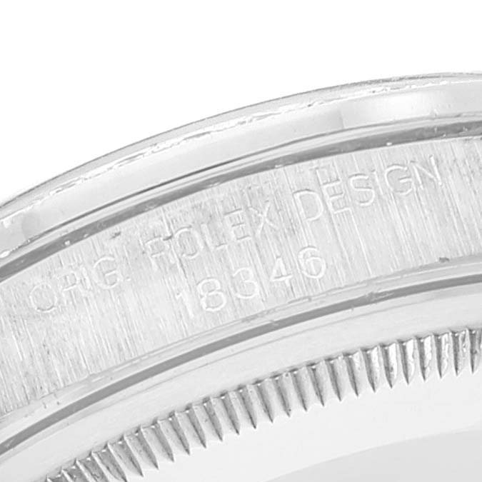 The image shows a close-up of the case edge of a Rolex President 18346 Men's Platinum Silver Dial 18346 Men's Platinum Silver Dial model watch, featuring "ROLEX DESIGN 18346" engraving.