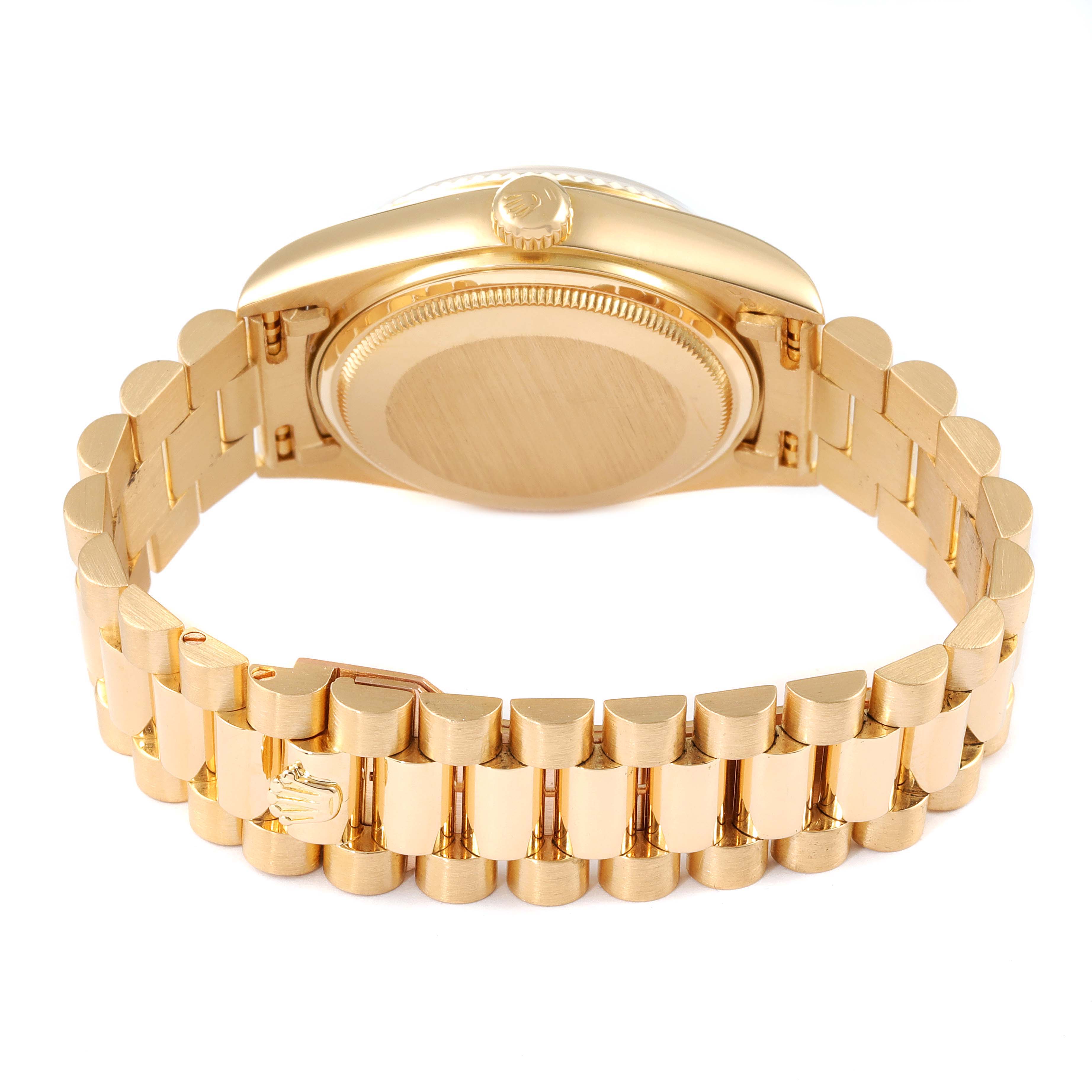 This image shows the backside and bracelet of the Rolex President 18038 Men's Yellow Gold Champagne Dial 18038 Men's Yellow Gold Champagne Dial model watch with a focus on the clasp and caseback.