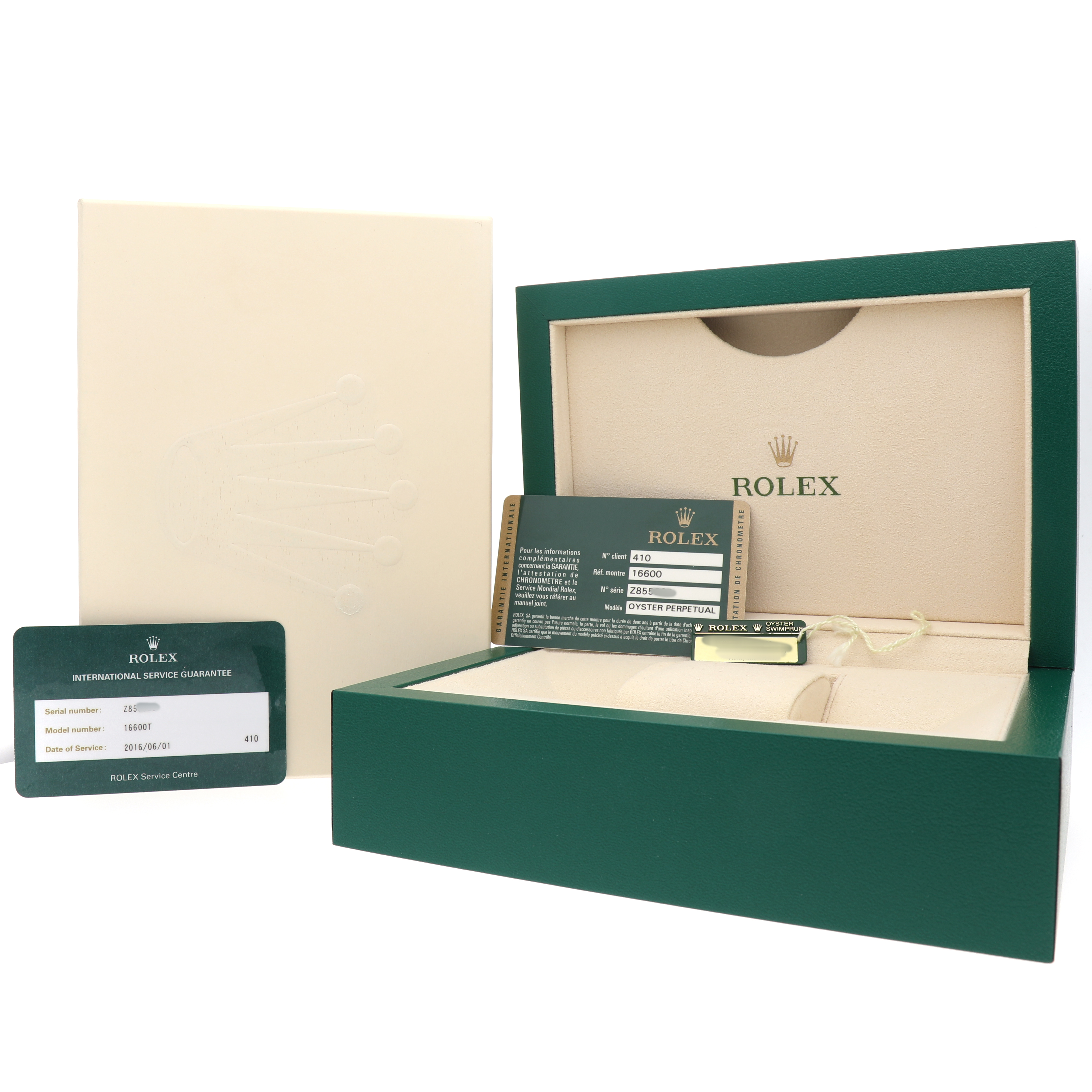 The image shows the Rolex Sea-Dweller 16600 Men's Stainless Steel Black Dial watch's packaging, guarantee card, and accessories from a frontal angle.