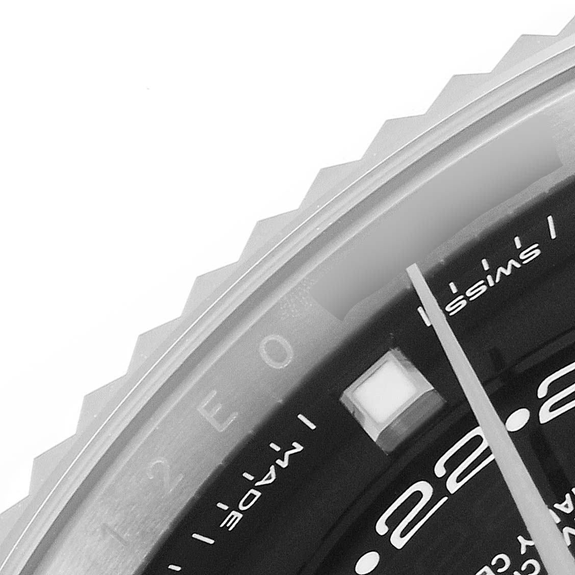 The image shows a close-up of the dial and bezel of a Rolex Sky-Dweller 326934 Men's Stainless Steel Black Dial 326934 Men's Stainless Steel Black Dial watch, including part of the minute hand and hour markers.