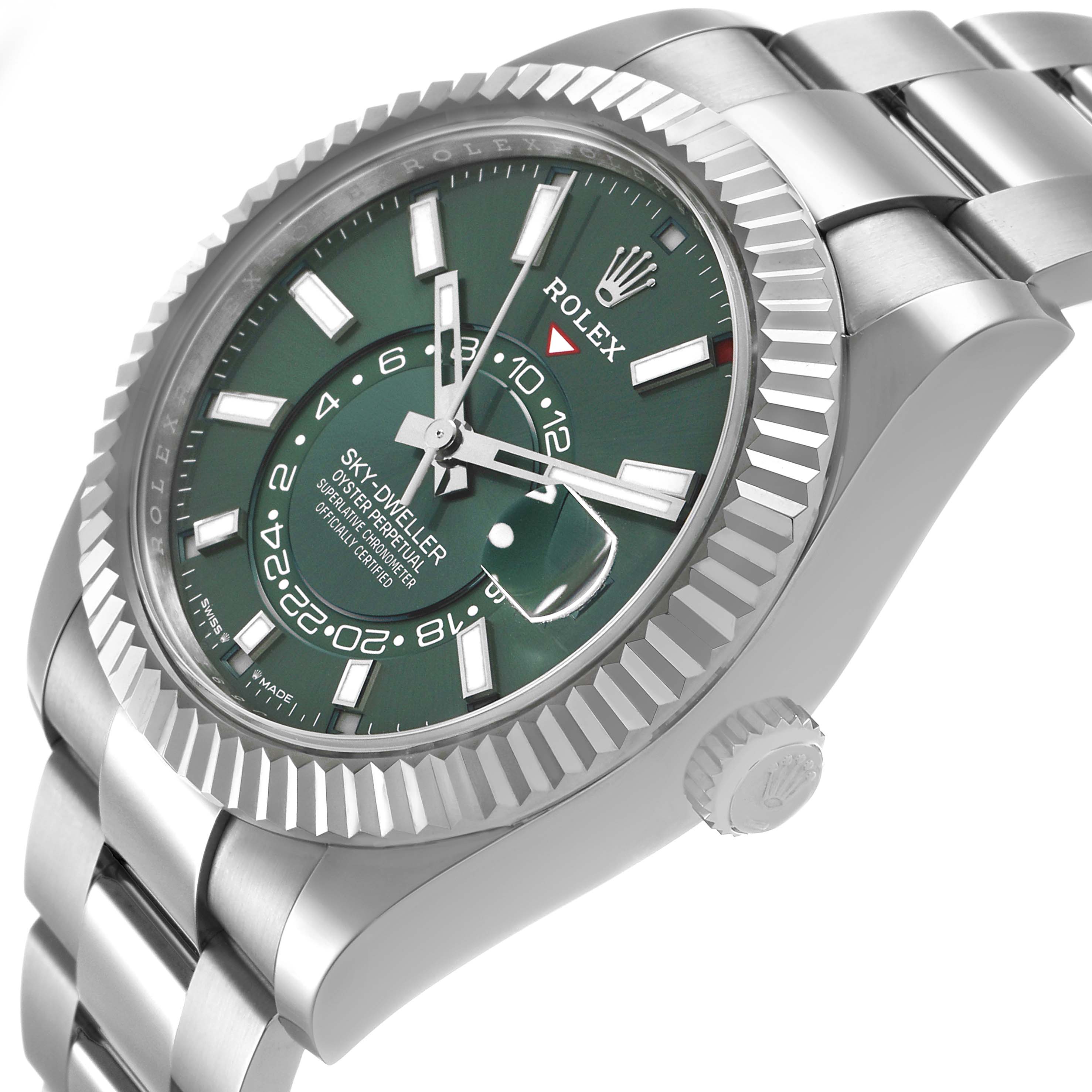 The Rolex Sky-Dweller 336934 Men's Stainless Steel Green Dial watch is shown at a three-quarter angle highlighting the green dial, fluted bezel, and bracelet.