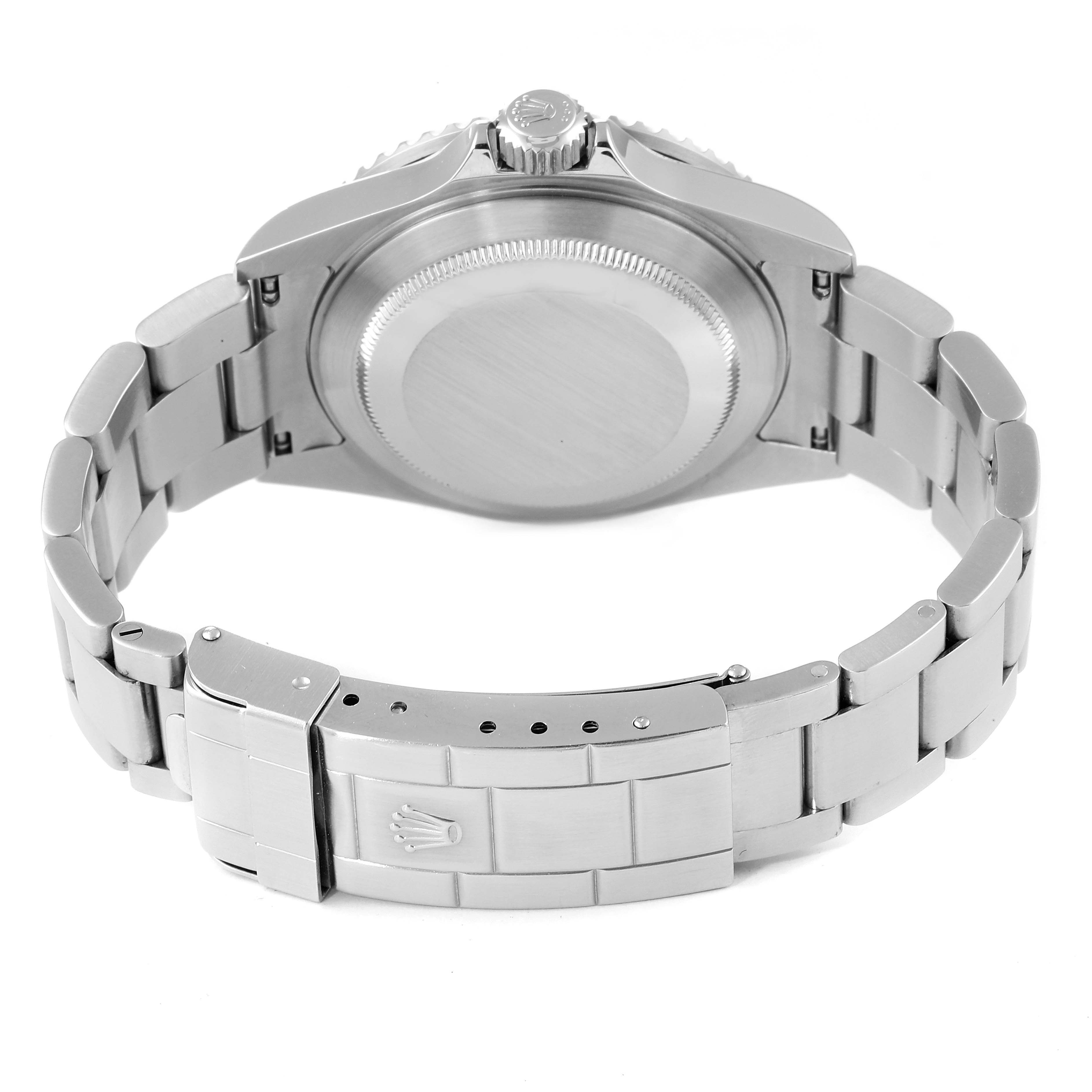 The image shows the back case and bracelet clasp of a Rolex Submariner 16610 Men
s Stainless Steel Black Dial 16610 Men
s Stainless Steel Black Dial watch from a rear angle.