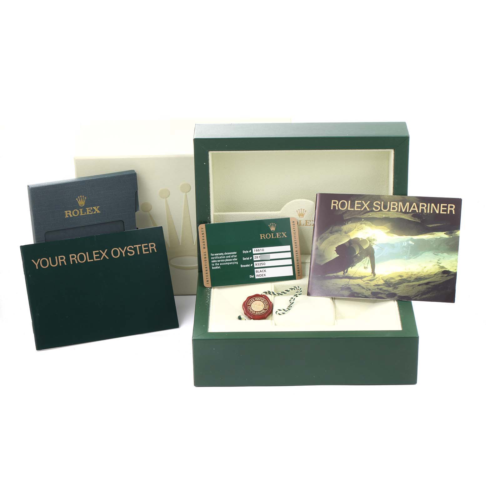 The image shows the packaging and accessories for a Rolex Submariner 16610 Men
s Stainless Steel Black Dial 16610 Men
s Stainless Steel Black Dial, including the box, warranty card, booklet, and tags.