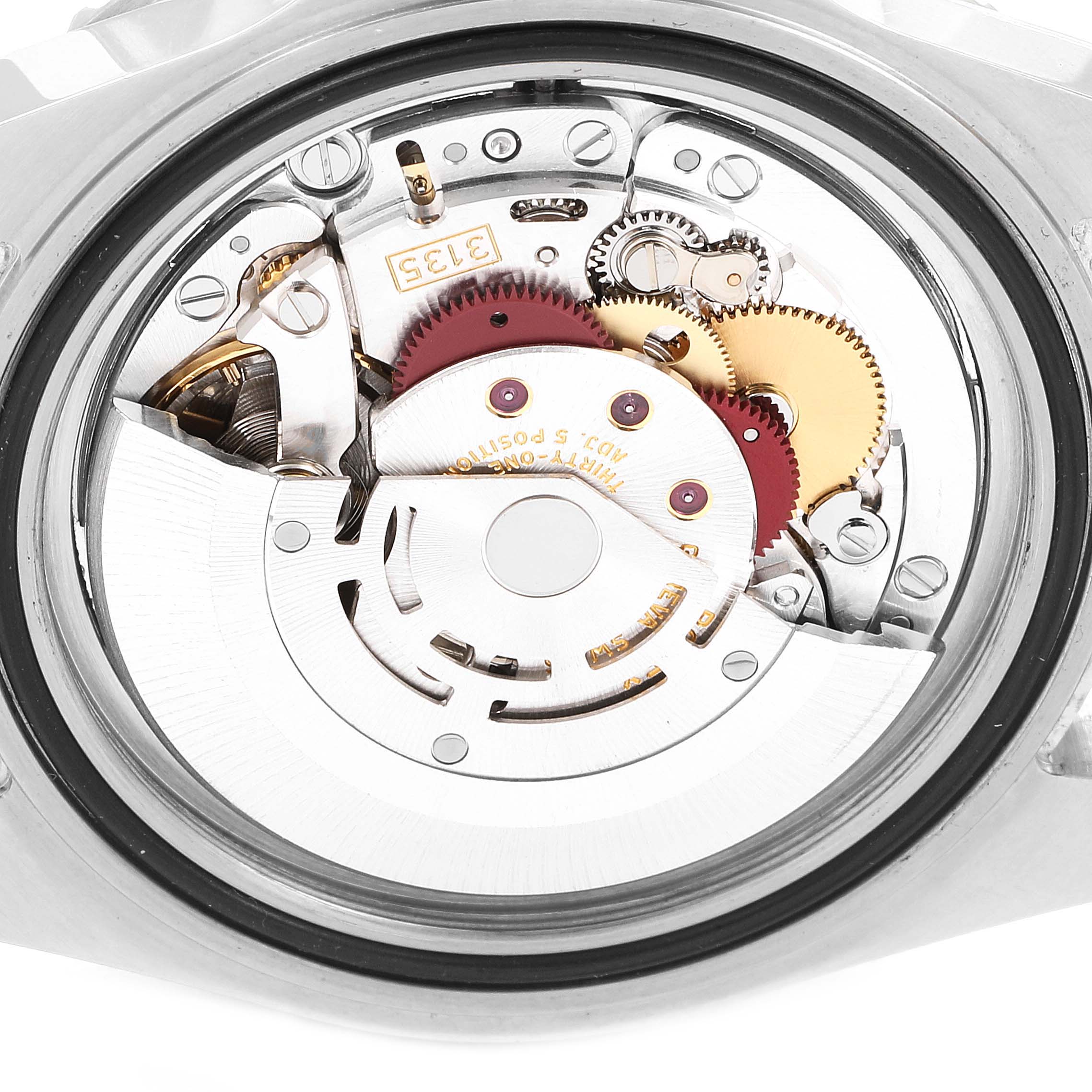 The image shows the internal mechanism of a Rolex Submariner 16610 Men
s Stainless Steel Black Dial 16610 Men
s Stainless Steel Black Dial watch viewed from the back.