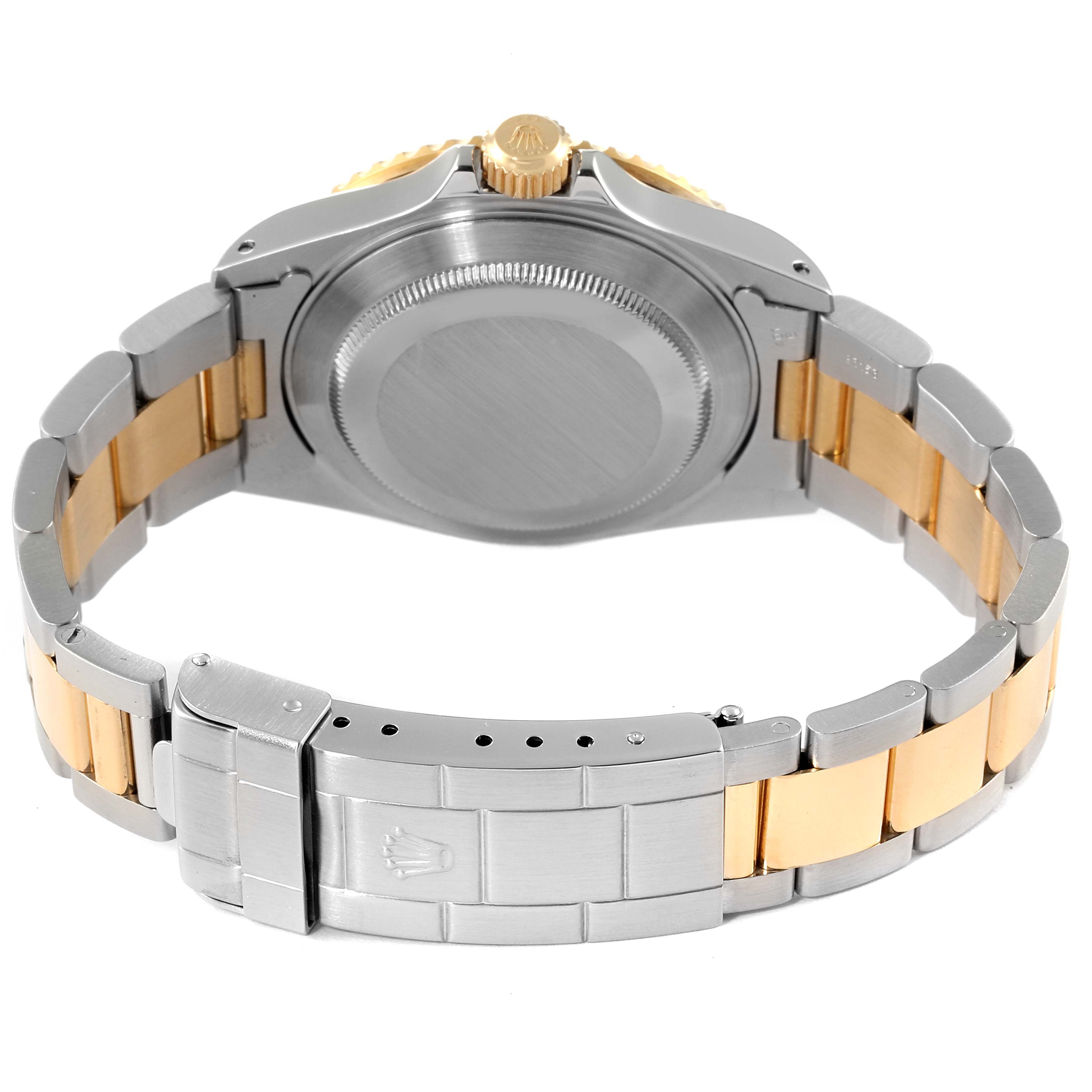 The image shows the back view and clasp of a Rolex Submariner 16613 Men
s Steel and Gold (two tone) Blue Dial 16613 Men
s Steel and Gold (two tone) Blue Dial, highlighting the two-tone bracelet and Oyster caseback.