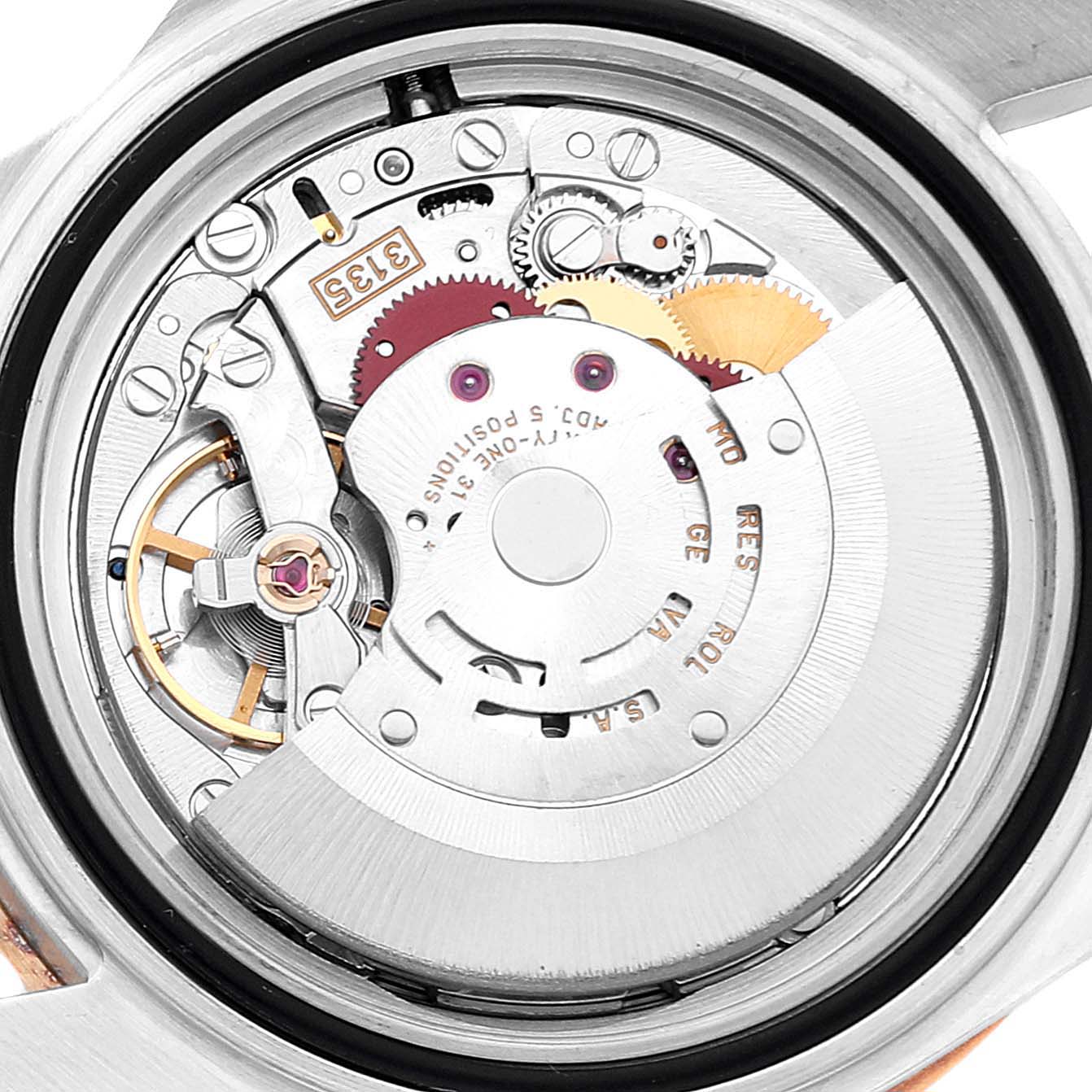This image shows the internal mechanism and movement of a Rolex Submariner 16613 Men
s Steel and Gold (two tone) Blue Dial 16613 Men
s Steel and Gold (two tone) Blue Dial watch from a top-down angle.