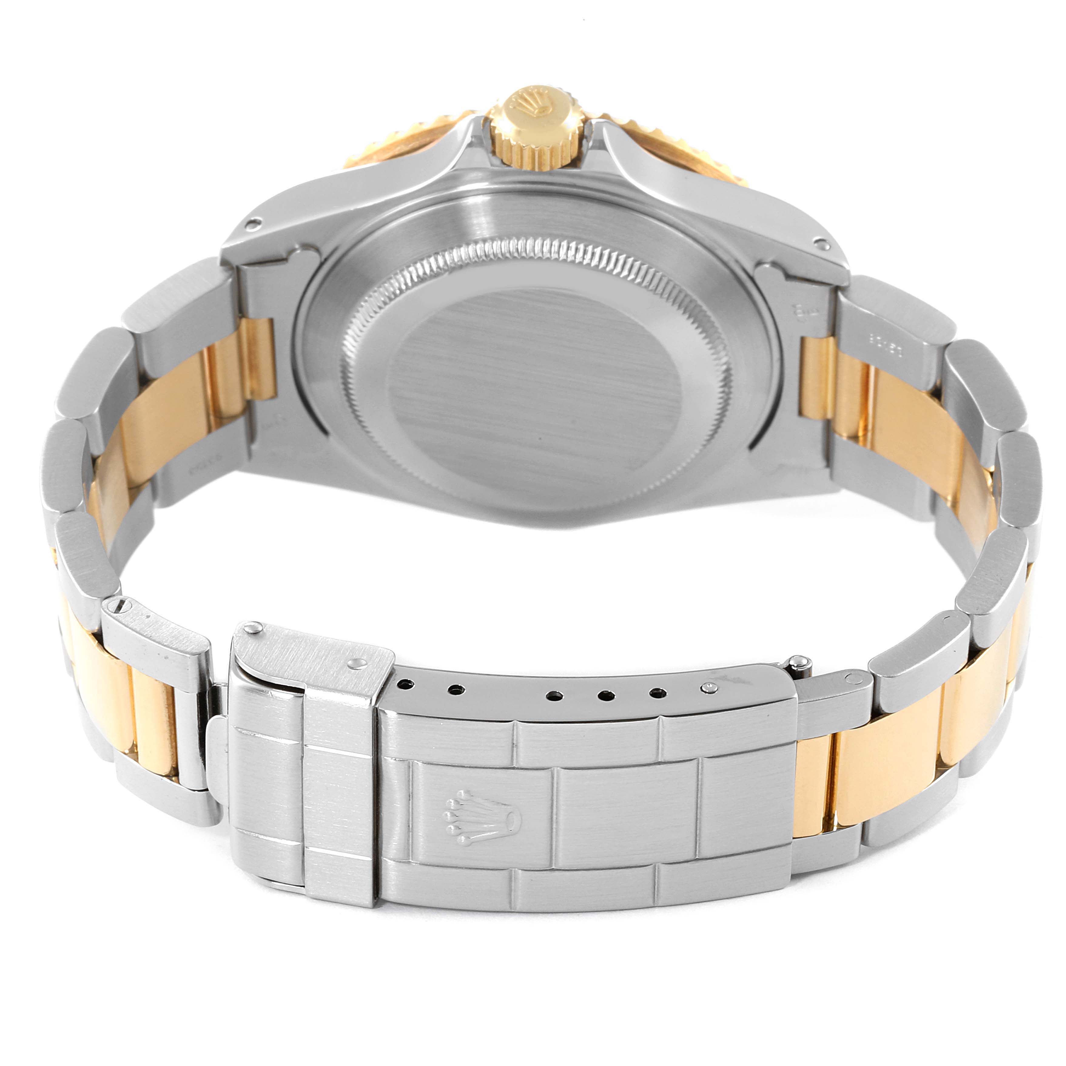 The image shows the back view of a Rolex Submariner 16613 Men
s Steel and Gold (two tone) Blue Dial 16613 Men
s Steel and Gold (two tone) Blue Dial watch, highlighting its bracelet, clasp, and case back.