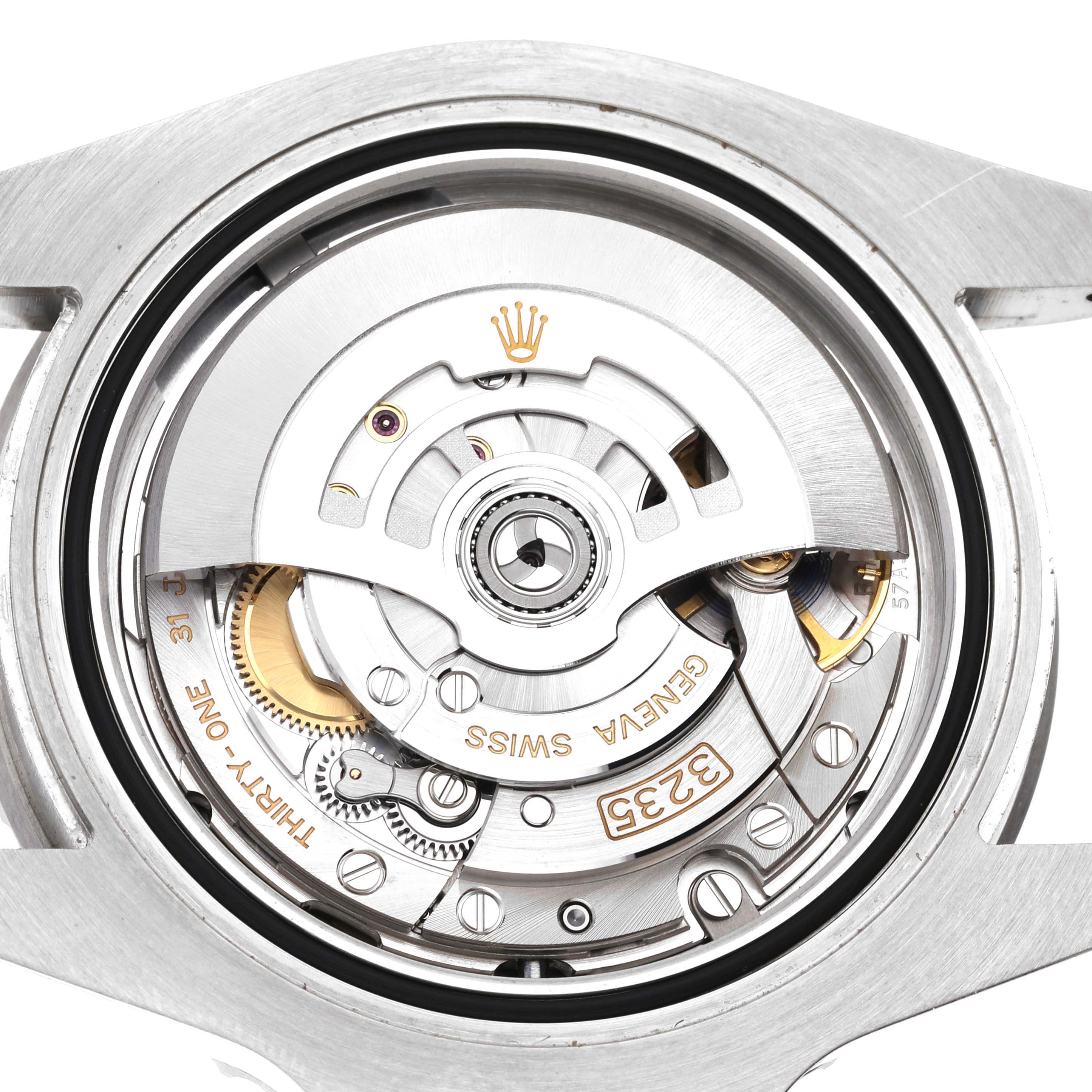 The image shows the movement mechanism of a Rolex Submariner 126610 Men
s Stainless Steel Black Dial 126610 Men
s Stainless Steel Black Dial watch from a rear angle.