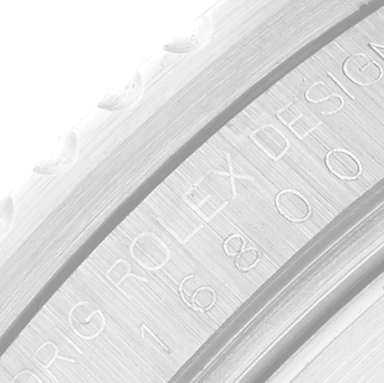 This close-up image shows engraving on the internal bezel of the Vintage Collection model by Rolex.