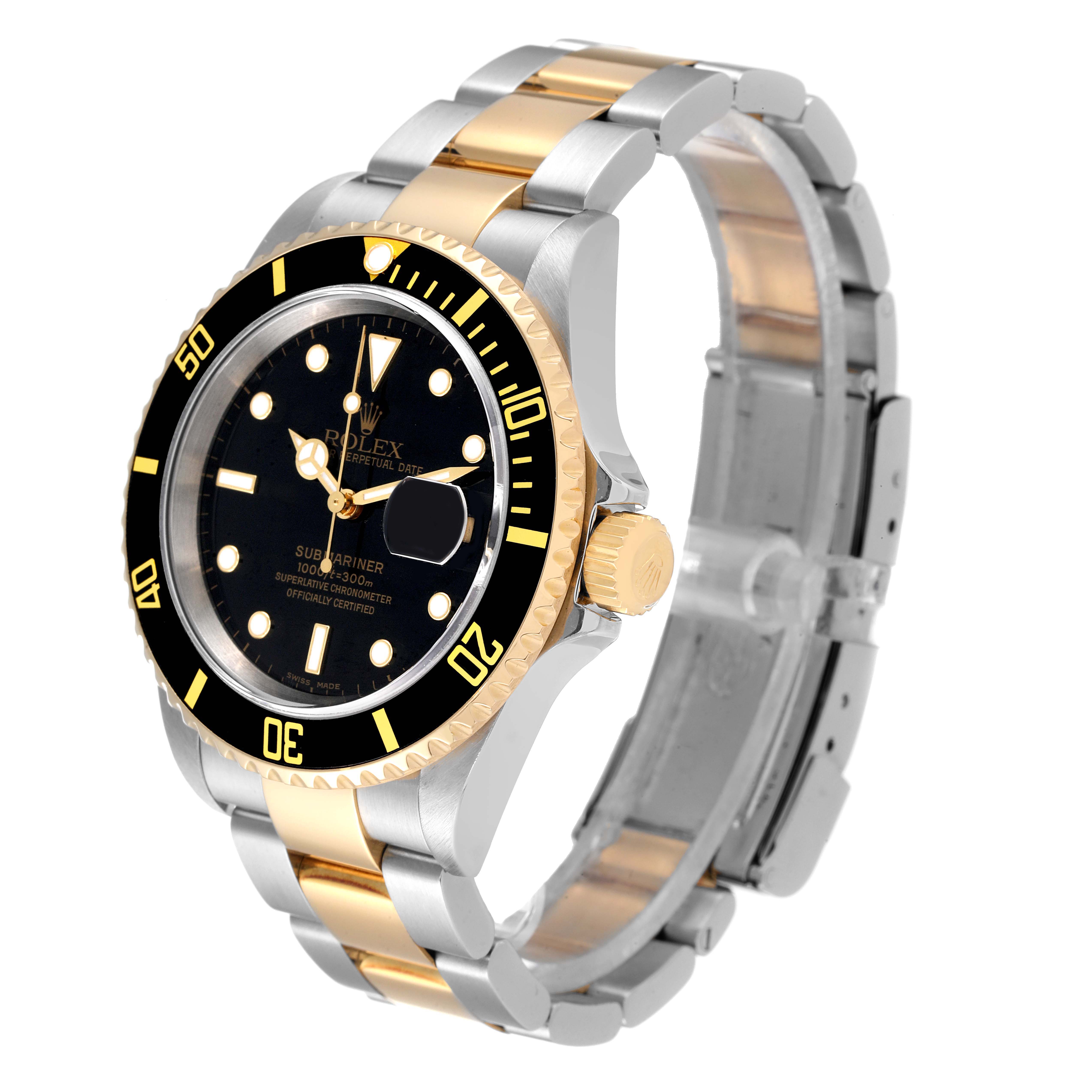 The image shows a Rolex Submariner 16613 Men's Steel and Gold (two tone) Black Dial 16613 Men's Steel and Gold (two tone) Black Dial watch at a three-quarter angle, highlighting its black dial, bezel, and two-tone metal bracelet.