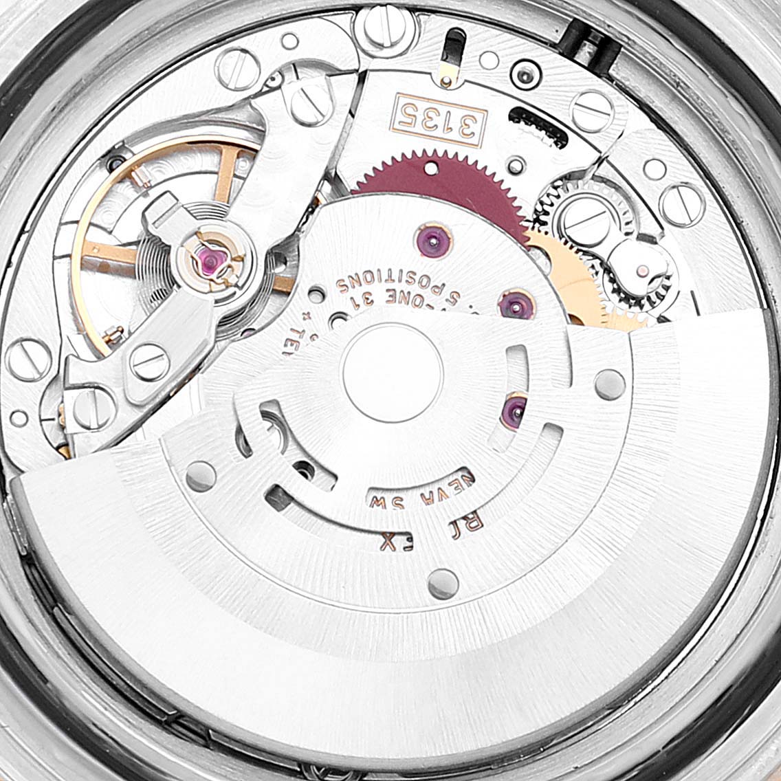 This close-up image shows the intricate movement mechanism of a Rolex Submariner 16613 Men's Steel and Gold (two tone) Black Dial 16613 Men's Steel and Gold (two tone) Black Dial watch.