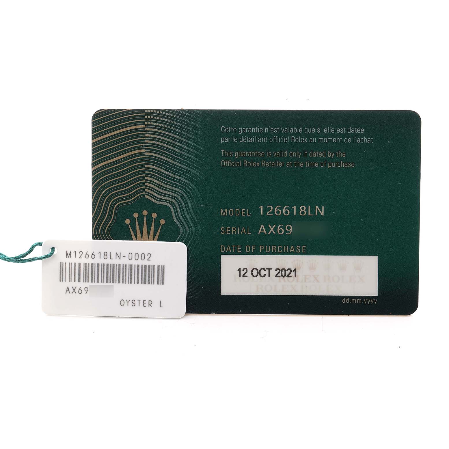 The image shows a warranty card for the Rolex Submariner 126618 Men
s Yellow Gold Black Dial 126618 Men
s Yellow Gold Black Dial with model and serial numbers.