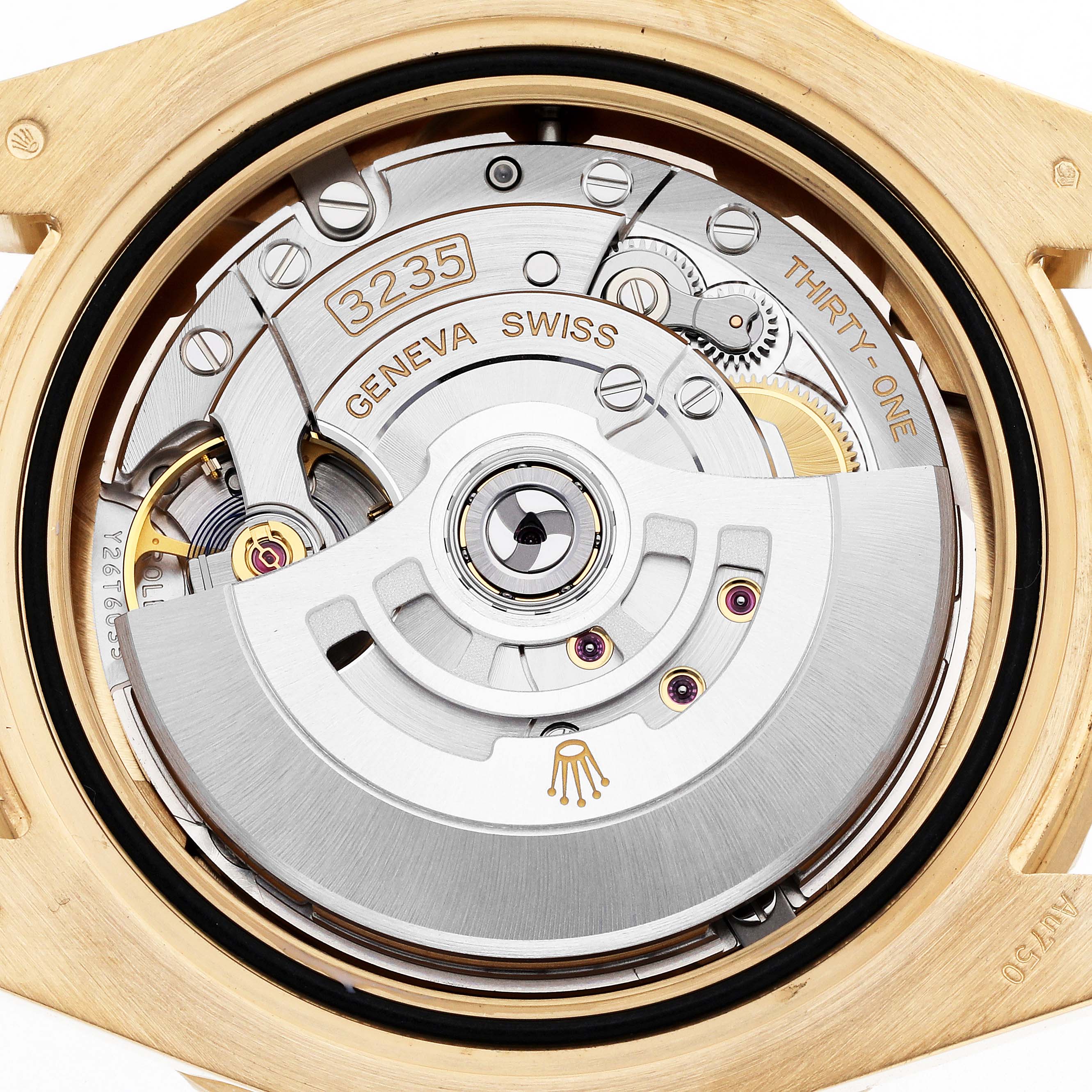 The image shows the Rolex Submariner 126618 Men
s Yellow Gold Black Dial 126618 Men
s Yellow Gold Black Dial
s movement from a top-down angle, highlighting its internal mechanical components.