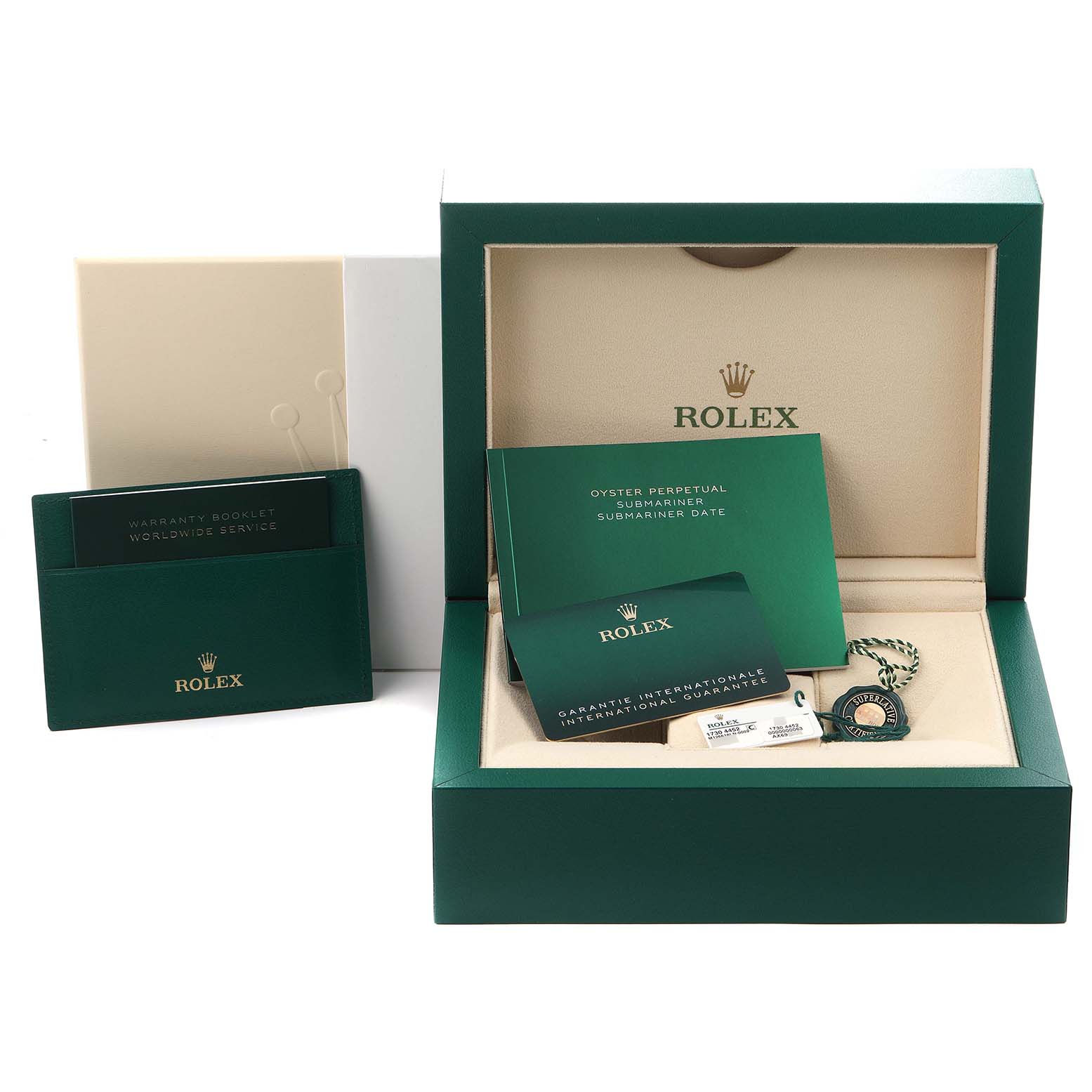 The image shows a Rolex Submariner 126618 Men
s Yellow Gold Black Dial 126618 Men
s Yellow Gold Black Dial box, warranty booklet, international guarantee, and a tag.